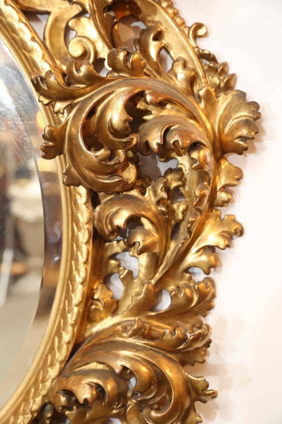 Pair of exceptional 18th century mirrors. They are in beautiful condition
expertly carved and gilded. They are beveled and the glass is 
in lovely condition.