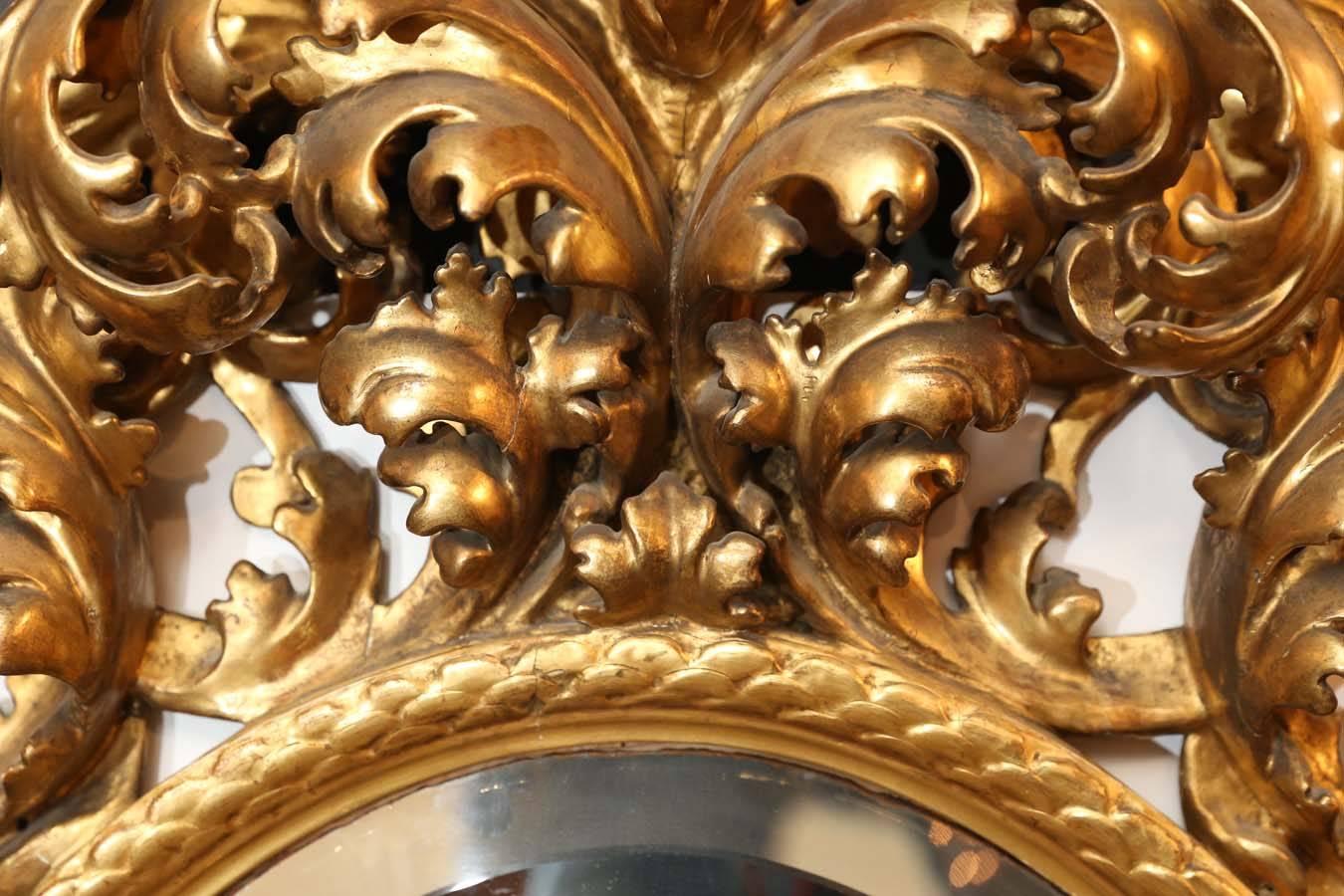 Gilt Pair of 18th Century Baroque Carved and Gilded Mirrors For Sale