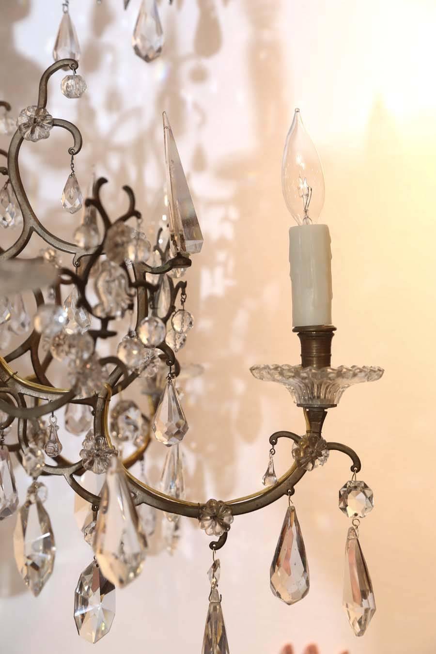 Venetian twelve-light chandelier, exquisite form with glass central.
Post.