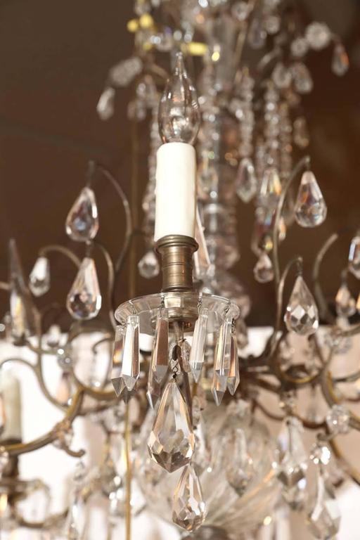  Venetian Bronze and Crystal Chandelier; with two tiers of lights In Excellent Condition In Houston, TX