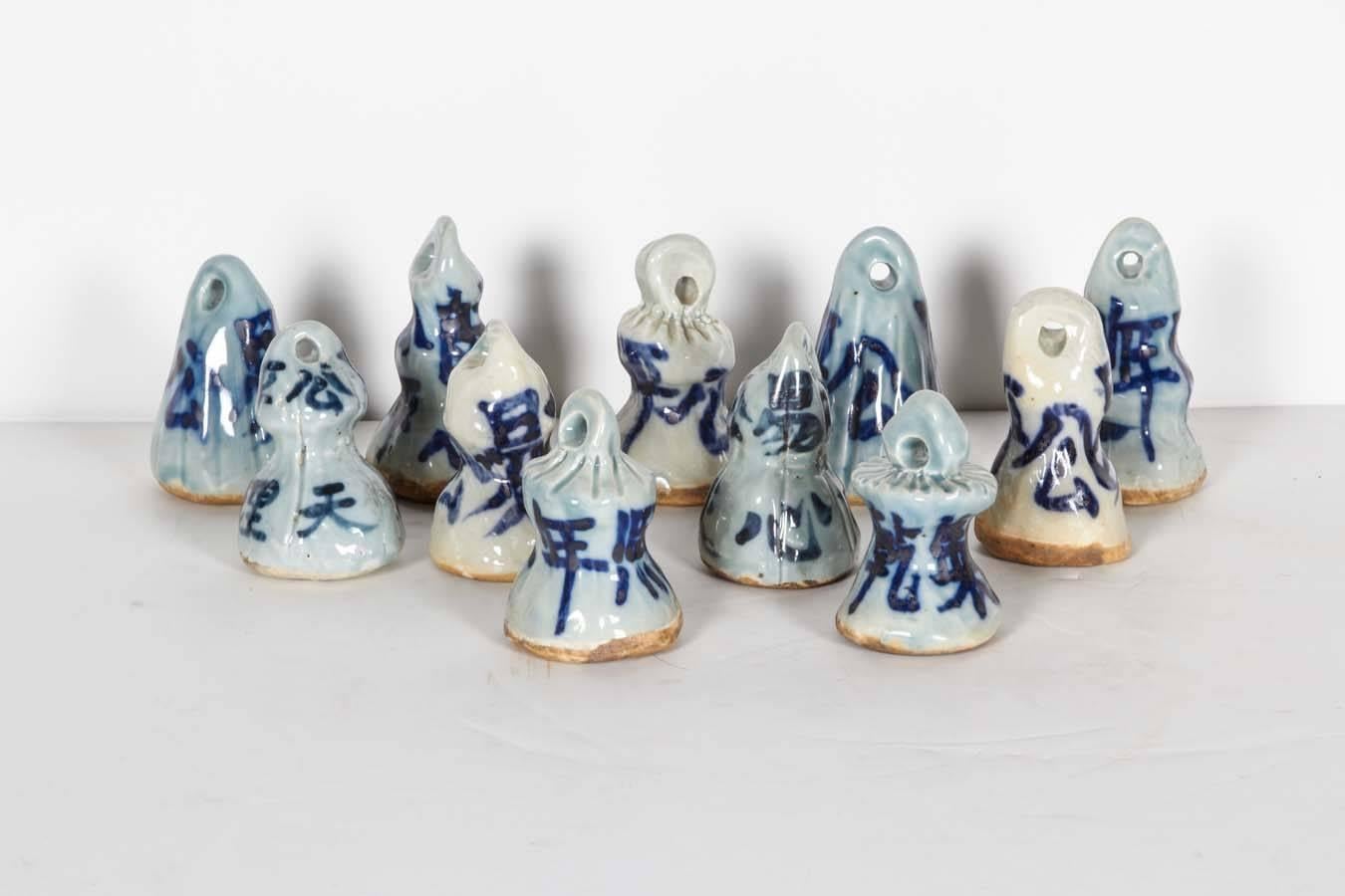 Chinese porcelain weight measures, circa 1920, from Shanxi Province. Each with distinctive shapes and Chinese characters. They work best as a collection. Several pieces available. Priced individually. Measurements vary, call shop for details.
CR737.