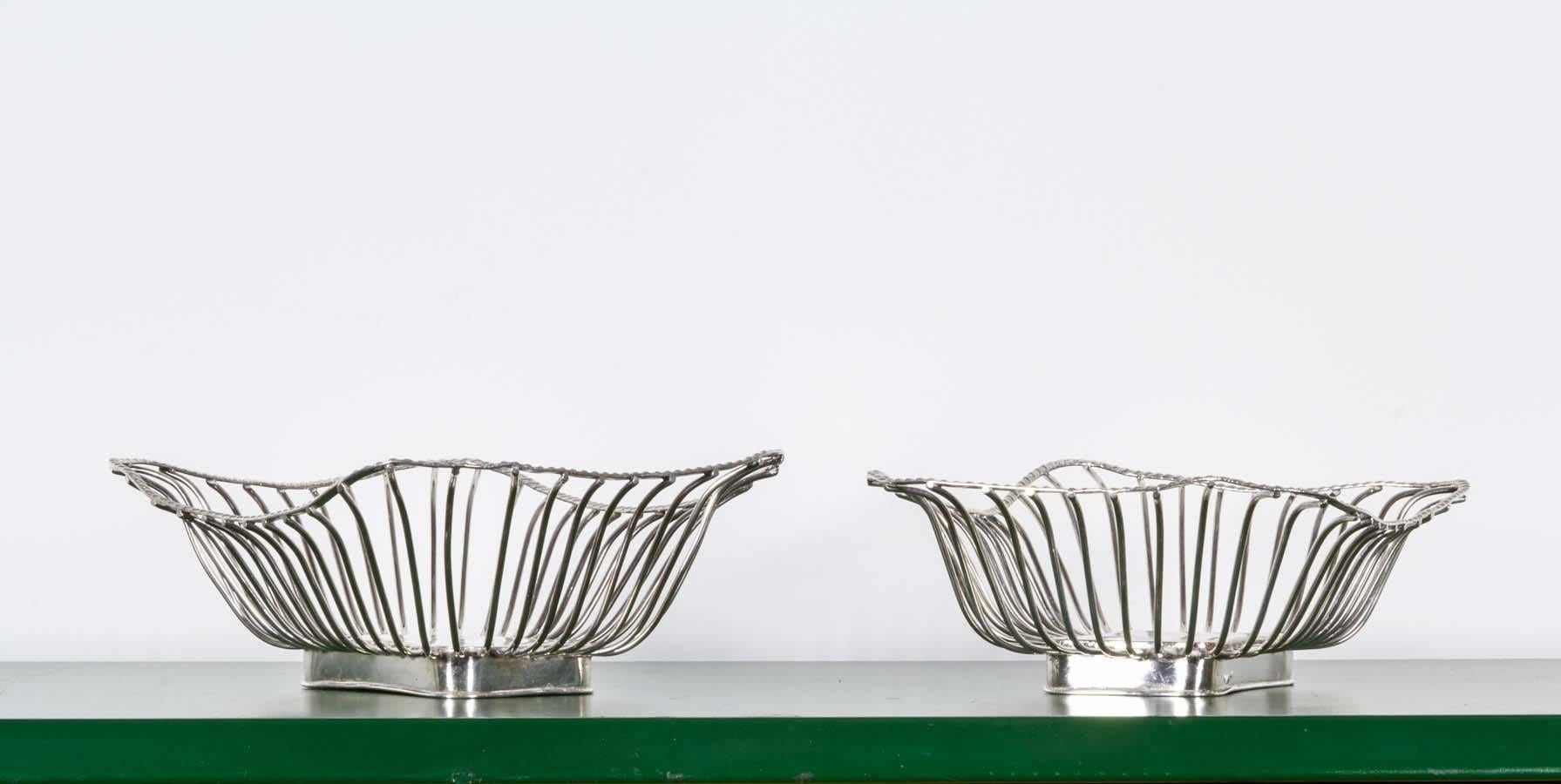 Pair of silver plate wire baskets. Stamped 
