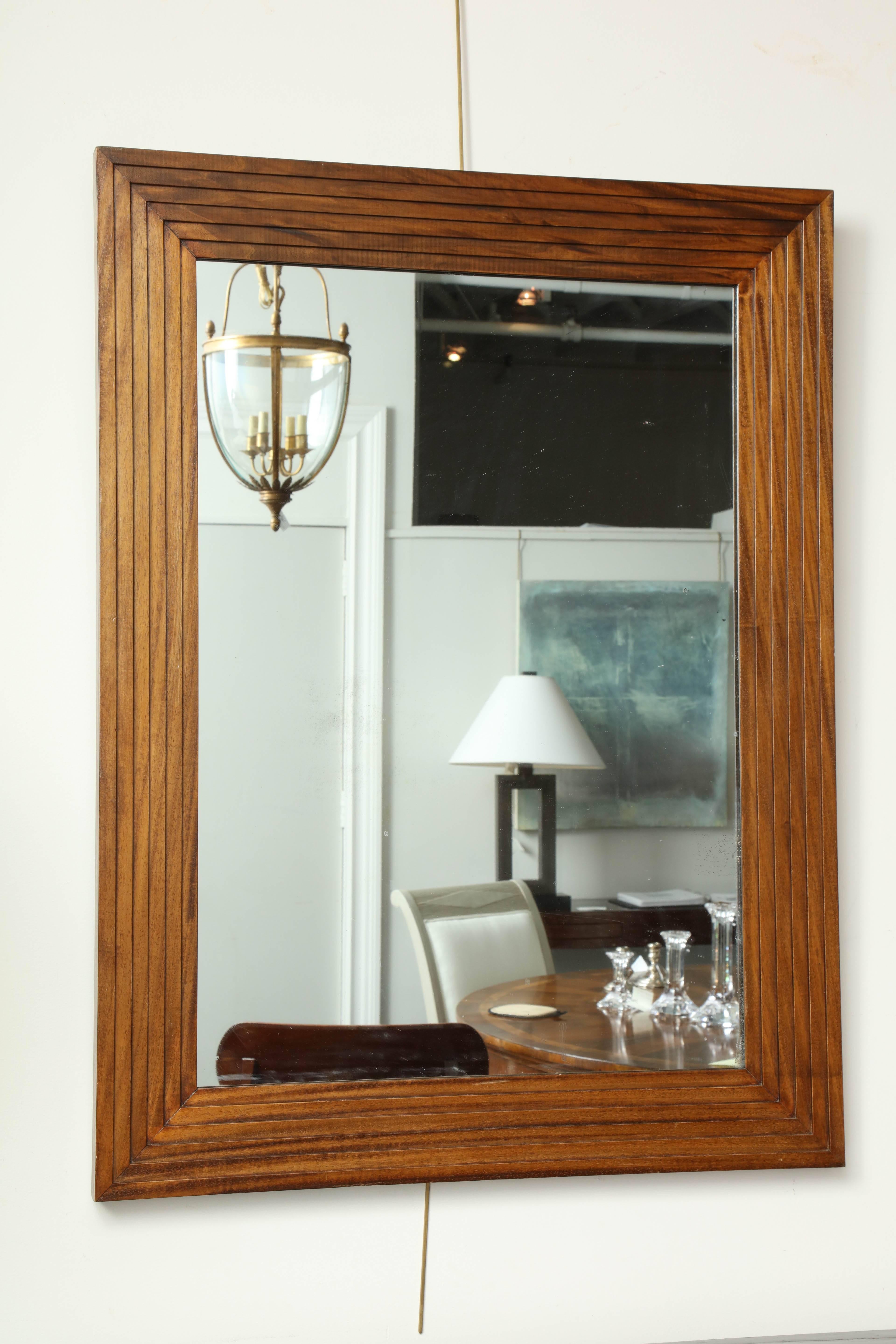 Mid-20th century mahogany mirror rectangular plate within stepped borders.