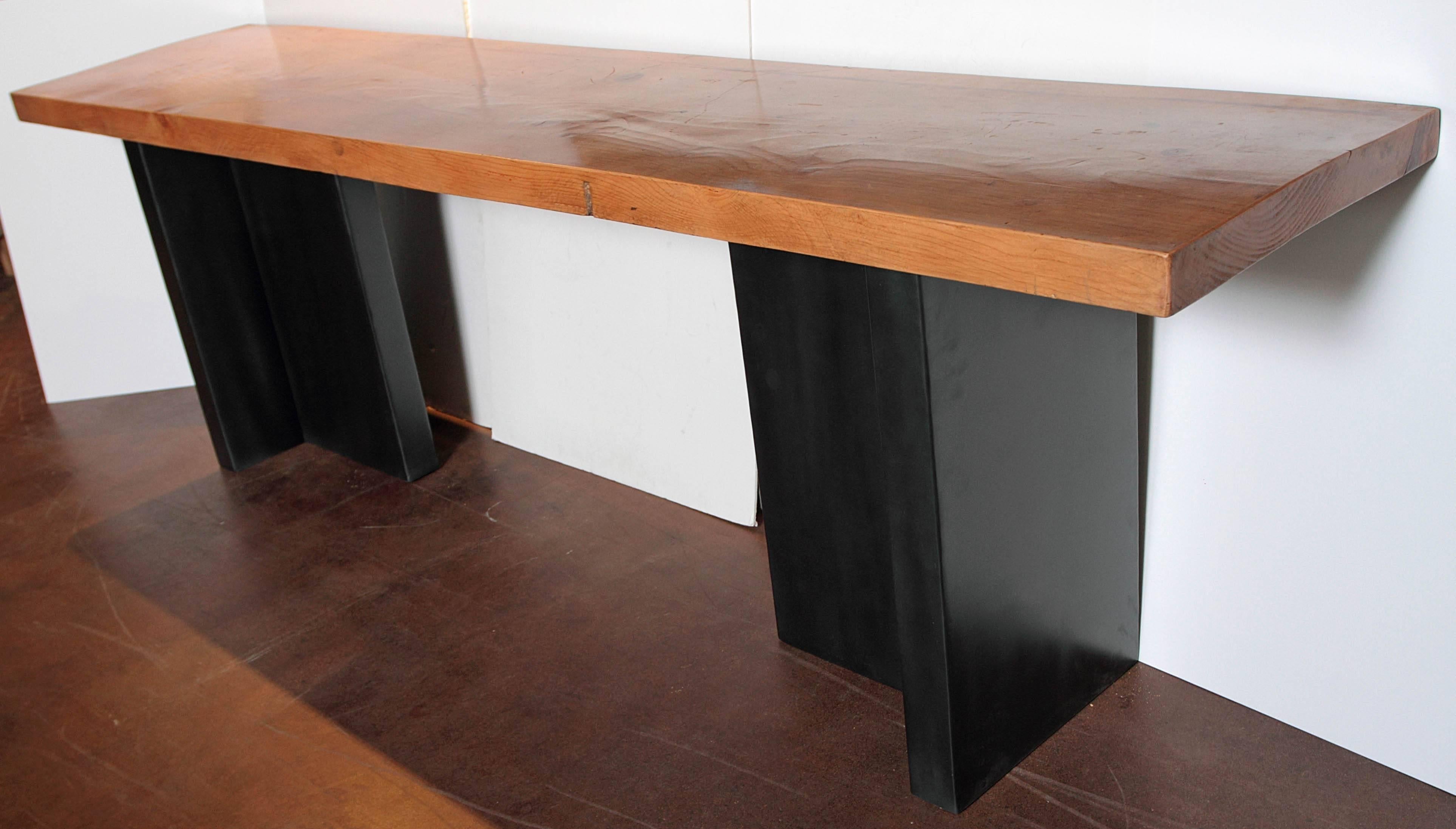 Contemporary Elm Slab Console Table 
Made from reclaimed elm slab with a honey medium tone coloration
Artisan crafted contemporary modern ebony color steel base 
Can be used as console table or sofa table at 34"H 
 
