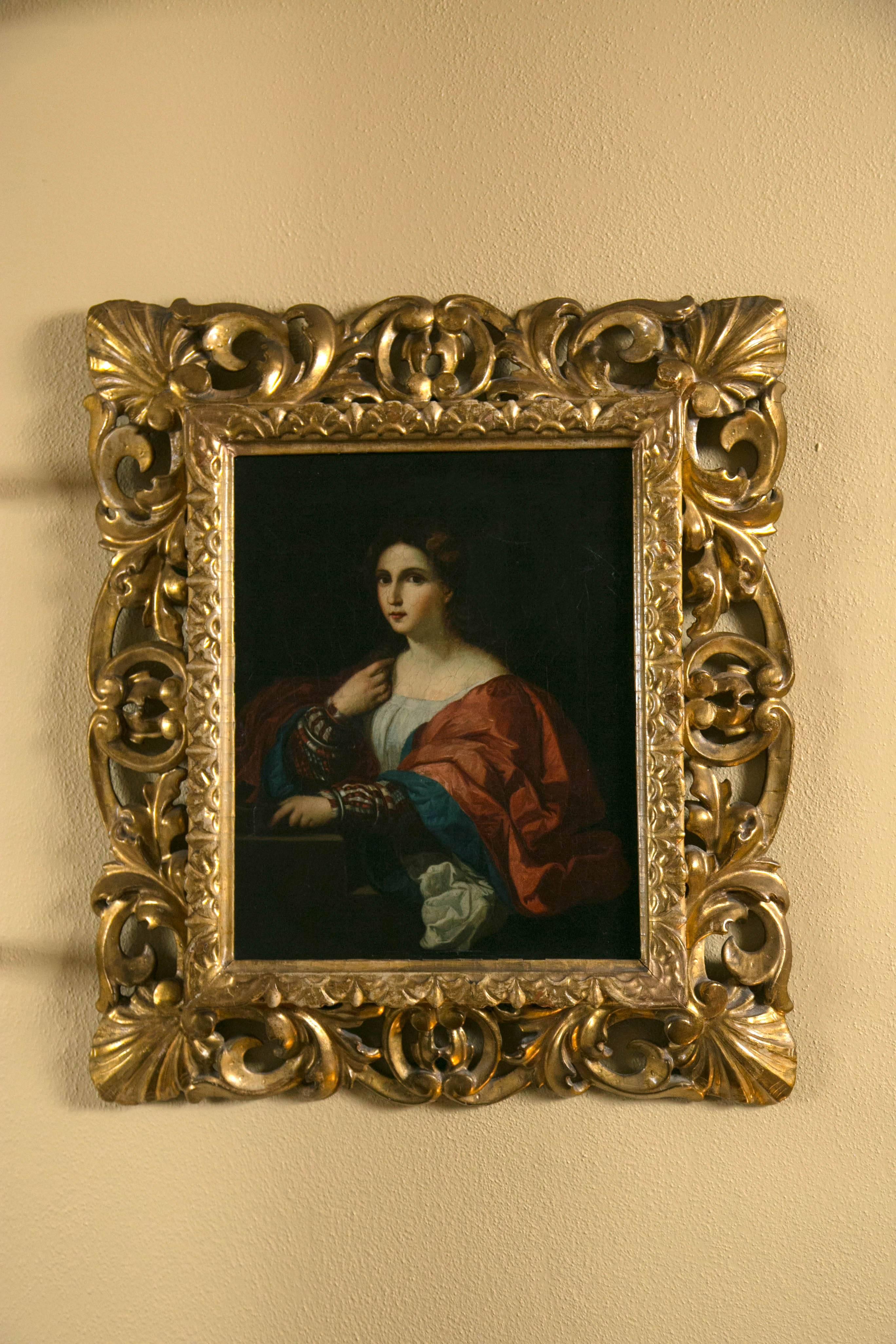 This unsigned portrait of a young noble woman is executed in the style of Renaissance Venetian painter Palma il Vecchio.