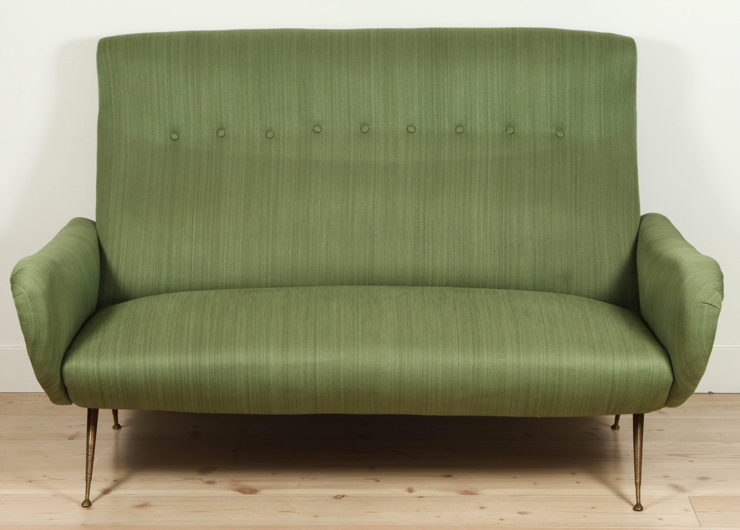 Italian green settee with brass details. All original.
