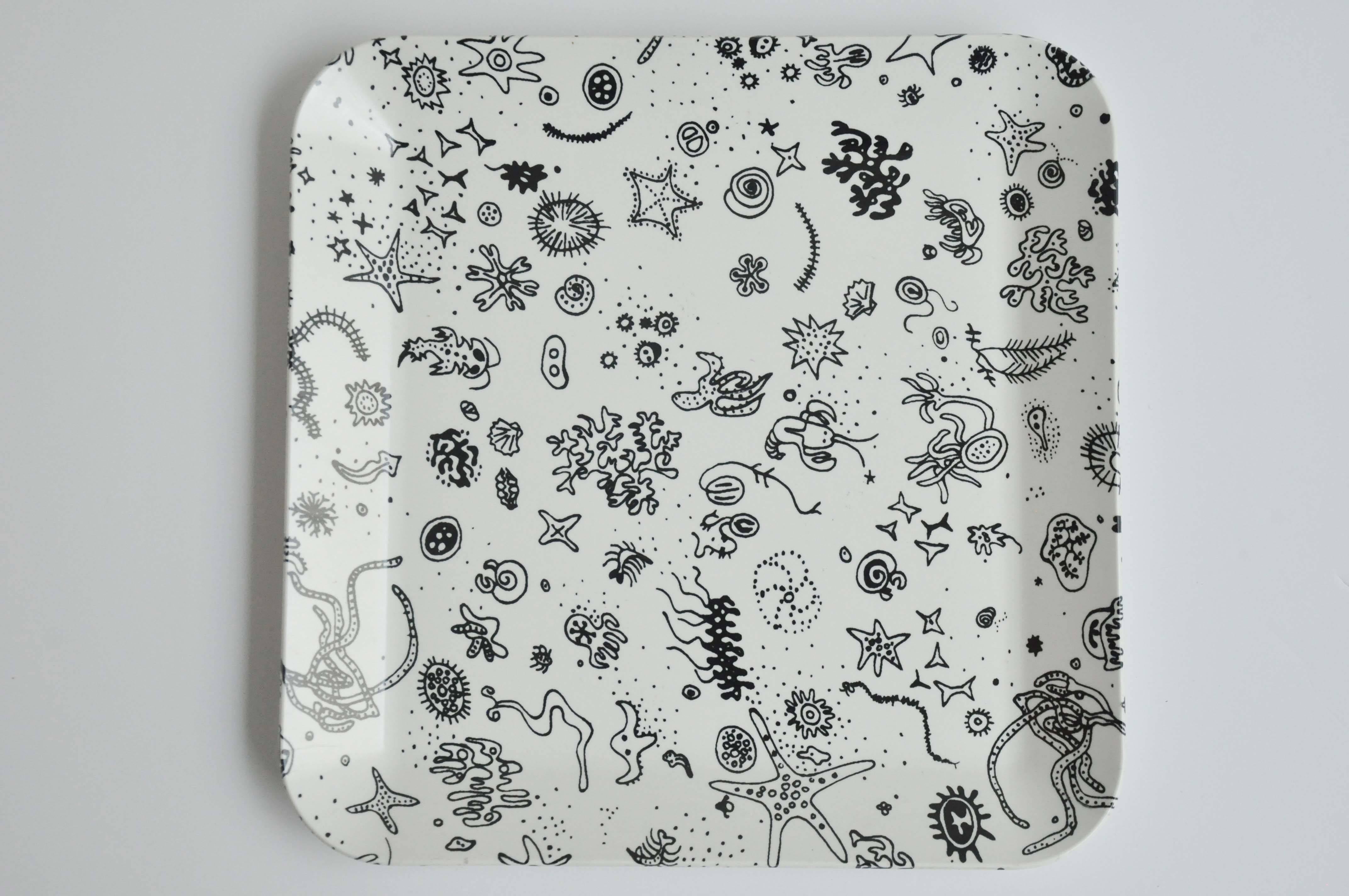 A rare, black and white plastic tray designed by Ray Eames, produced by Waverly Products in 1954. "Sea Things" was one of several fabric patterns designed by Ray for Schiffer Prints in 1950 for which she won a design award. An unusually