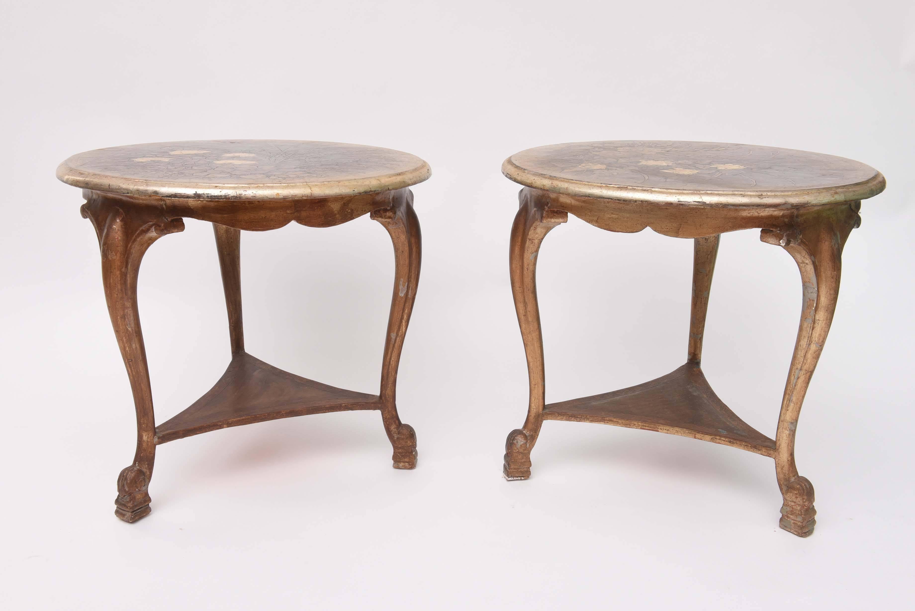 Beautiful pair of side tables with gilt leaf and painted floral decoration
designed and made by Max Kuehne.