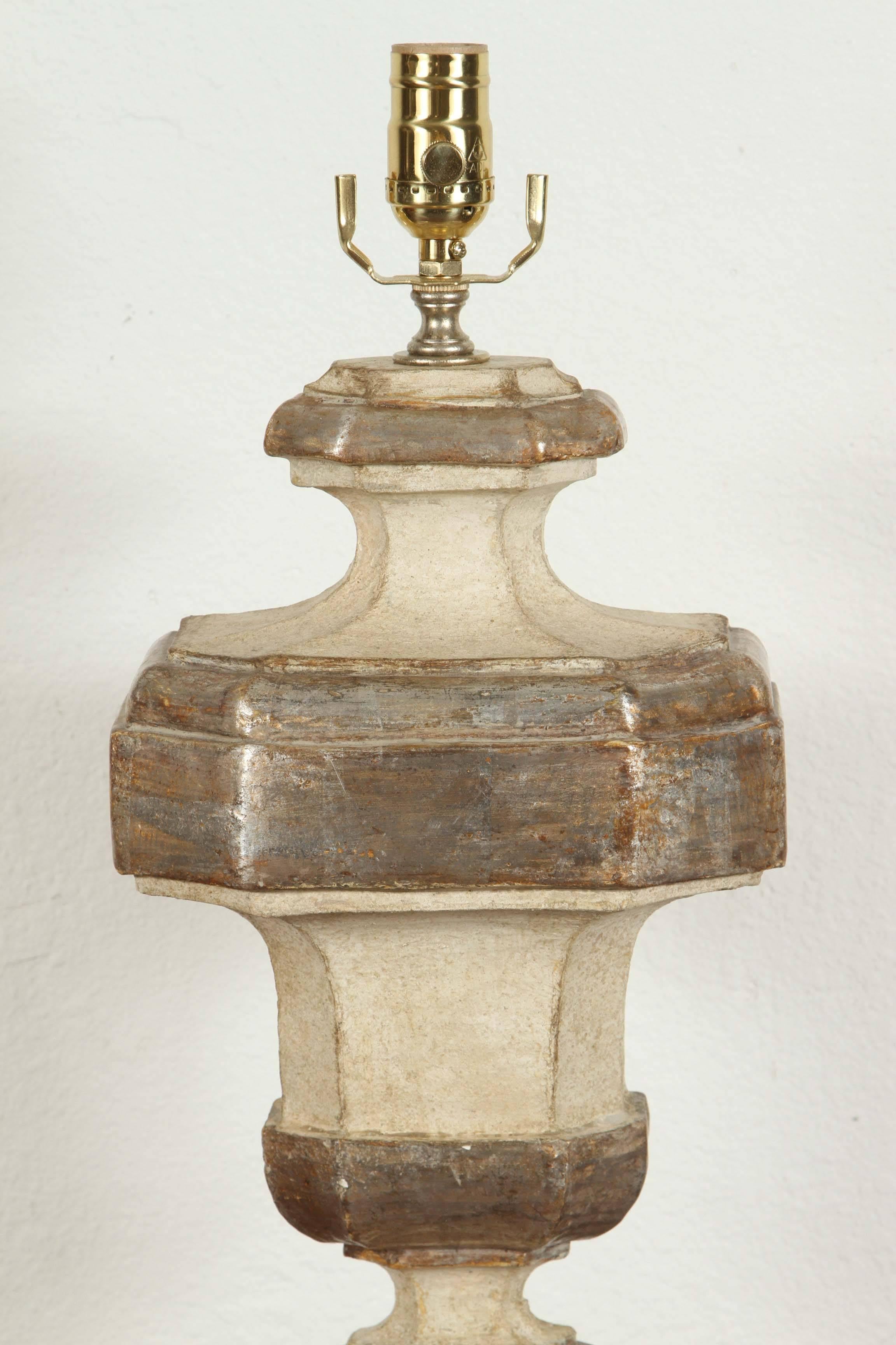 Carved, painted and silver gilt, urn-form lamps made for Antonio's Bella Casa in Italy and wired for U.S. current.