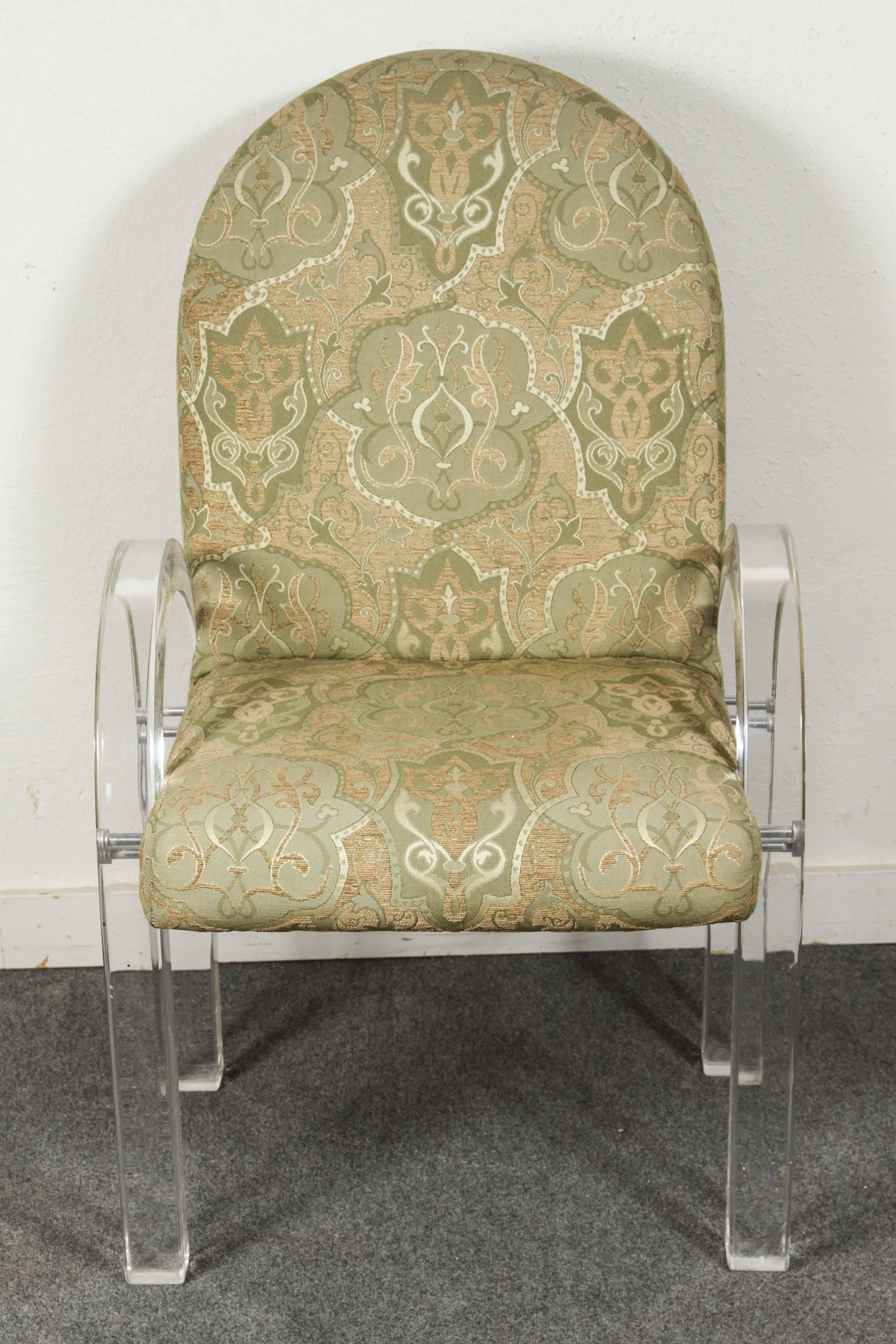 Large suite of 1970s, waterfall armchairs in custom upholstery.