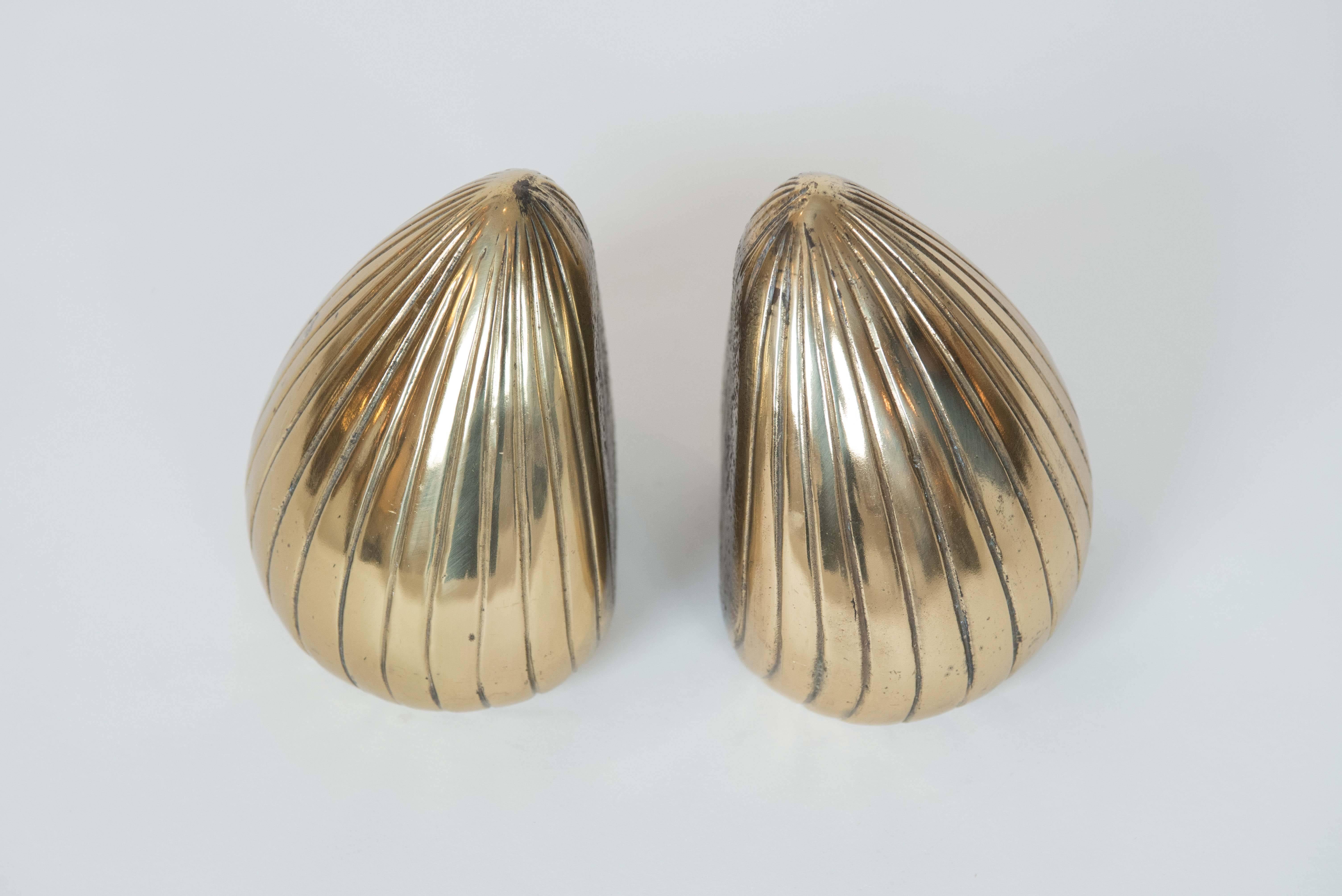 These Classic brass Ben Seibel bookends have been lightly polished and
have a lovely sculptural quality to them.