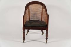 English Regency Mahogany and Cane Library Armchair, dated 1822