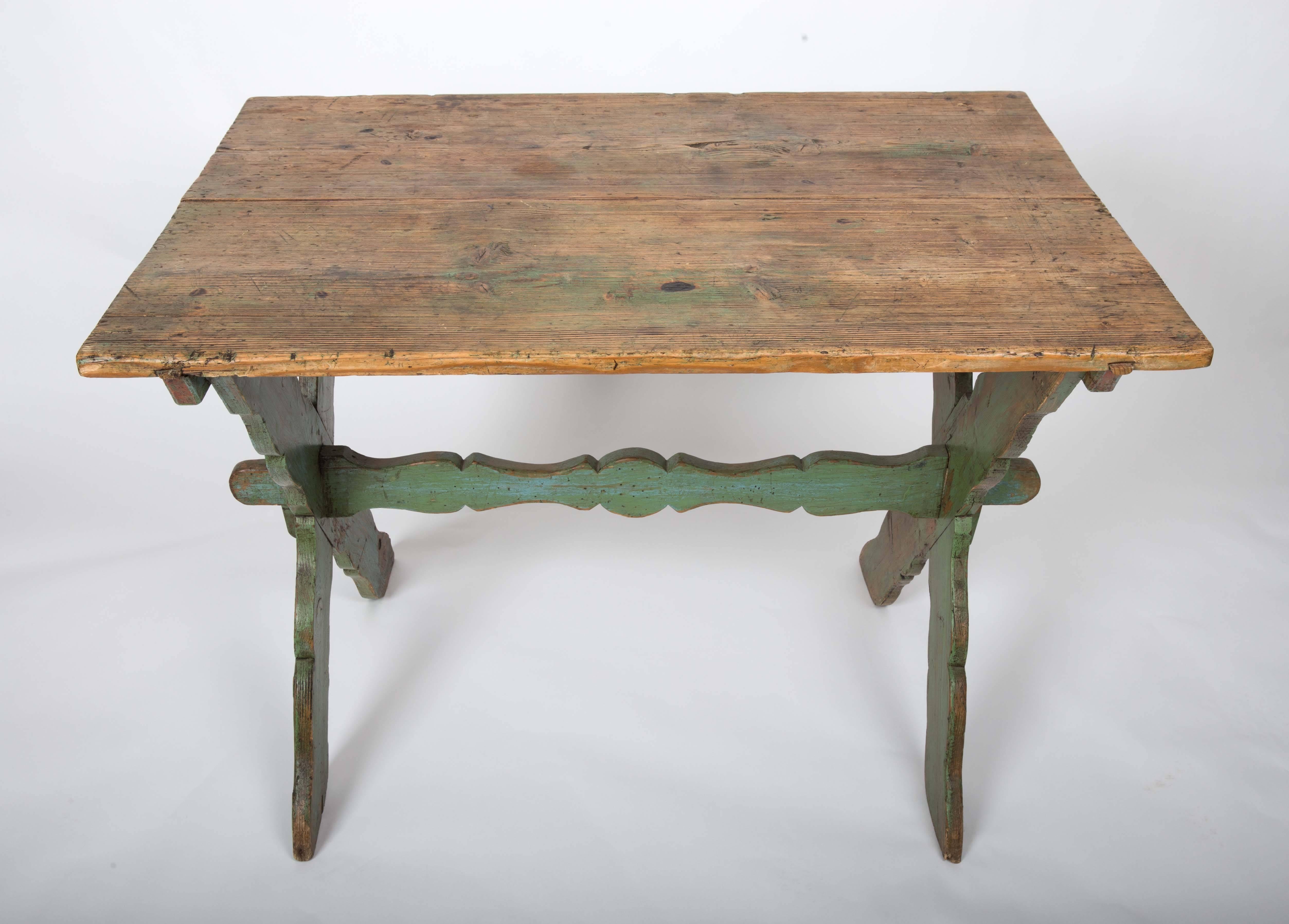 Rustic wooden table with patina and painted 
