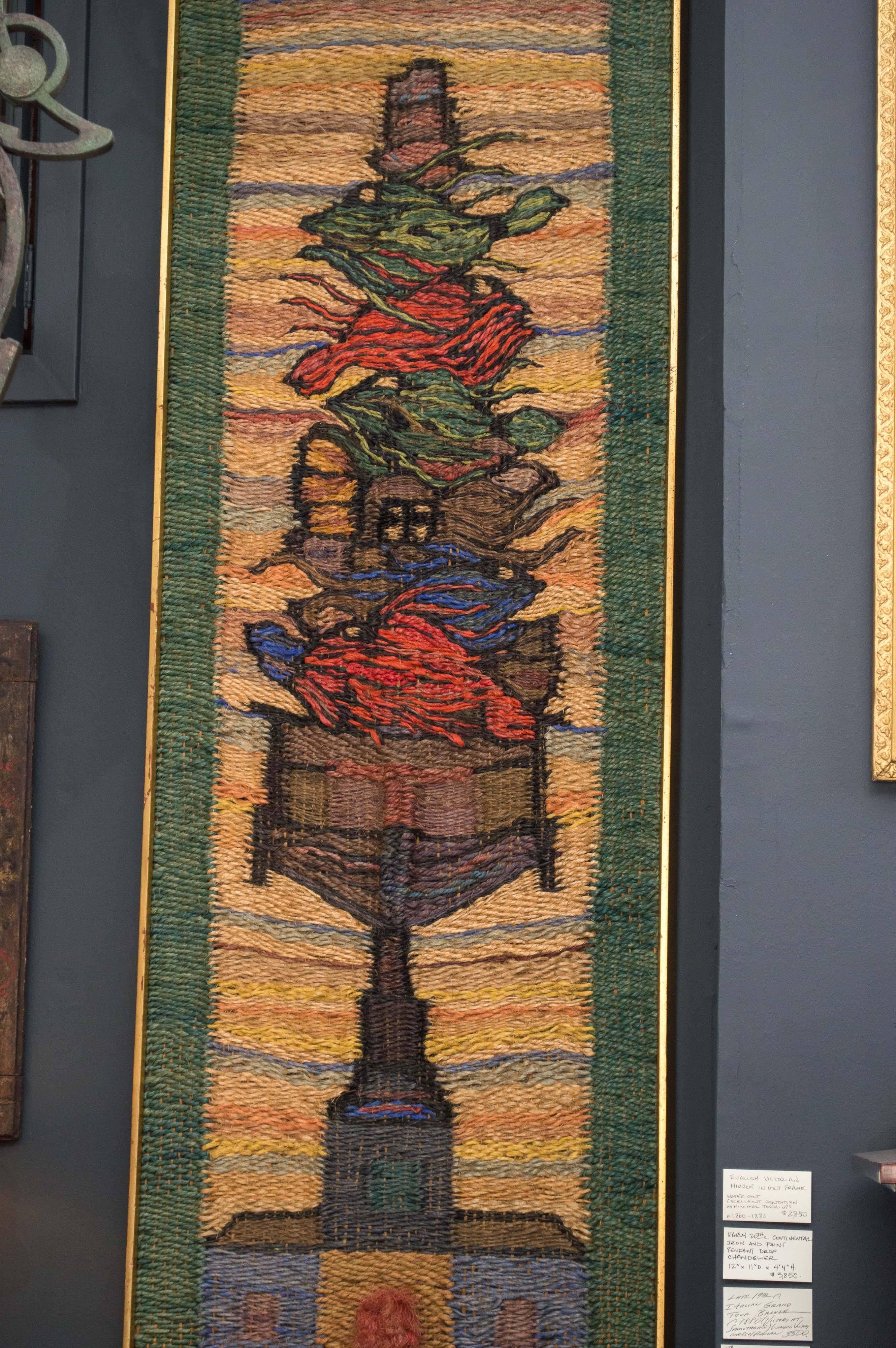 Framed hand-loomed jute weaving, circa 1970, by an unknown San Francisco artist. One of Four Seasons. Lively colors and intricate texture.