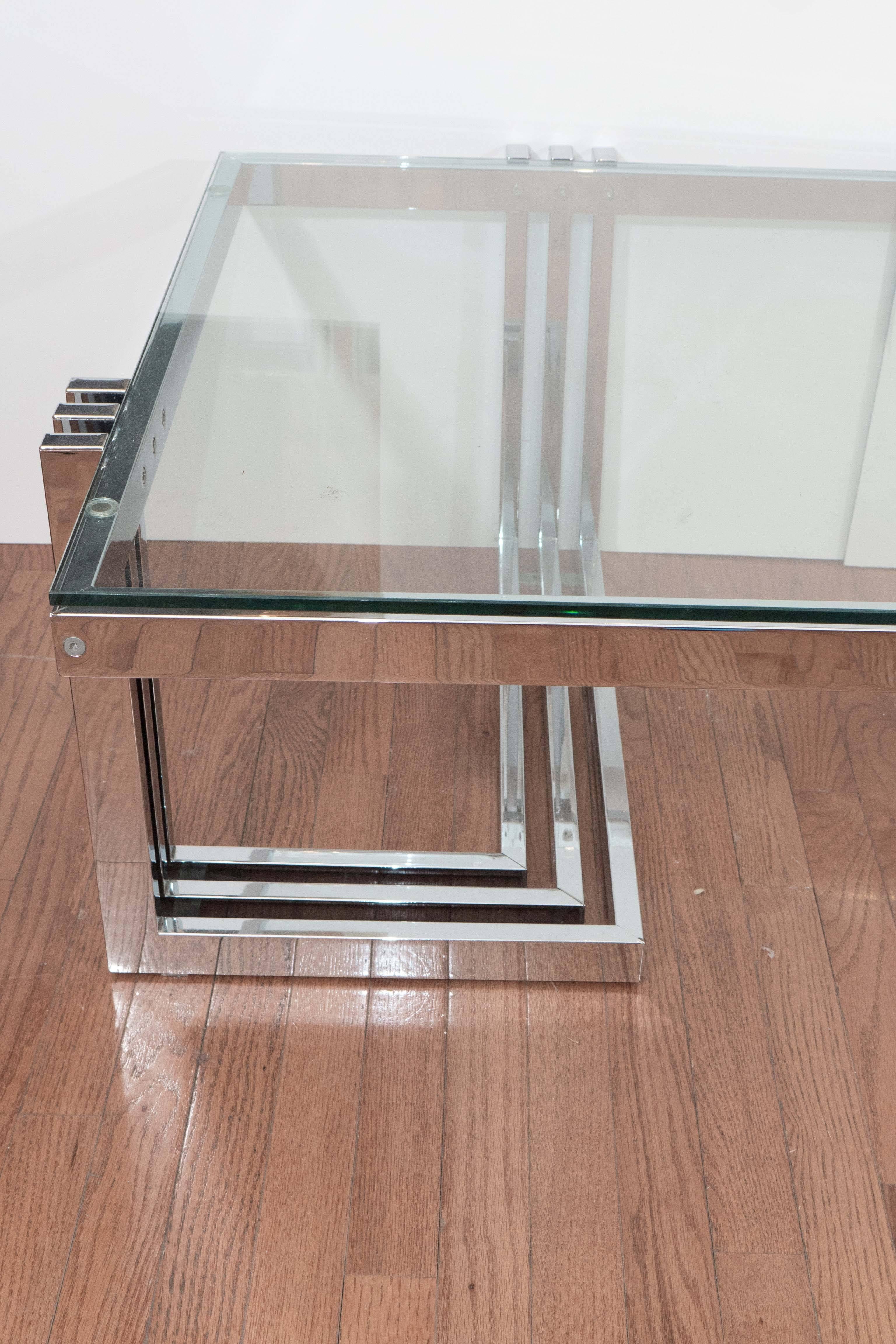 Chrome, linear design coffee table with inset glass top.