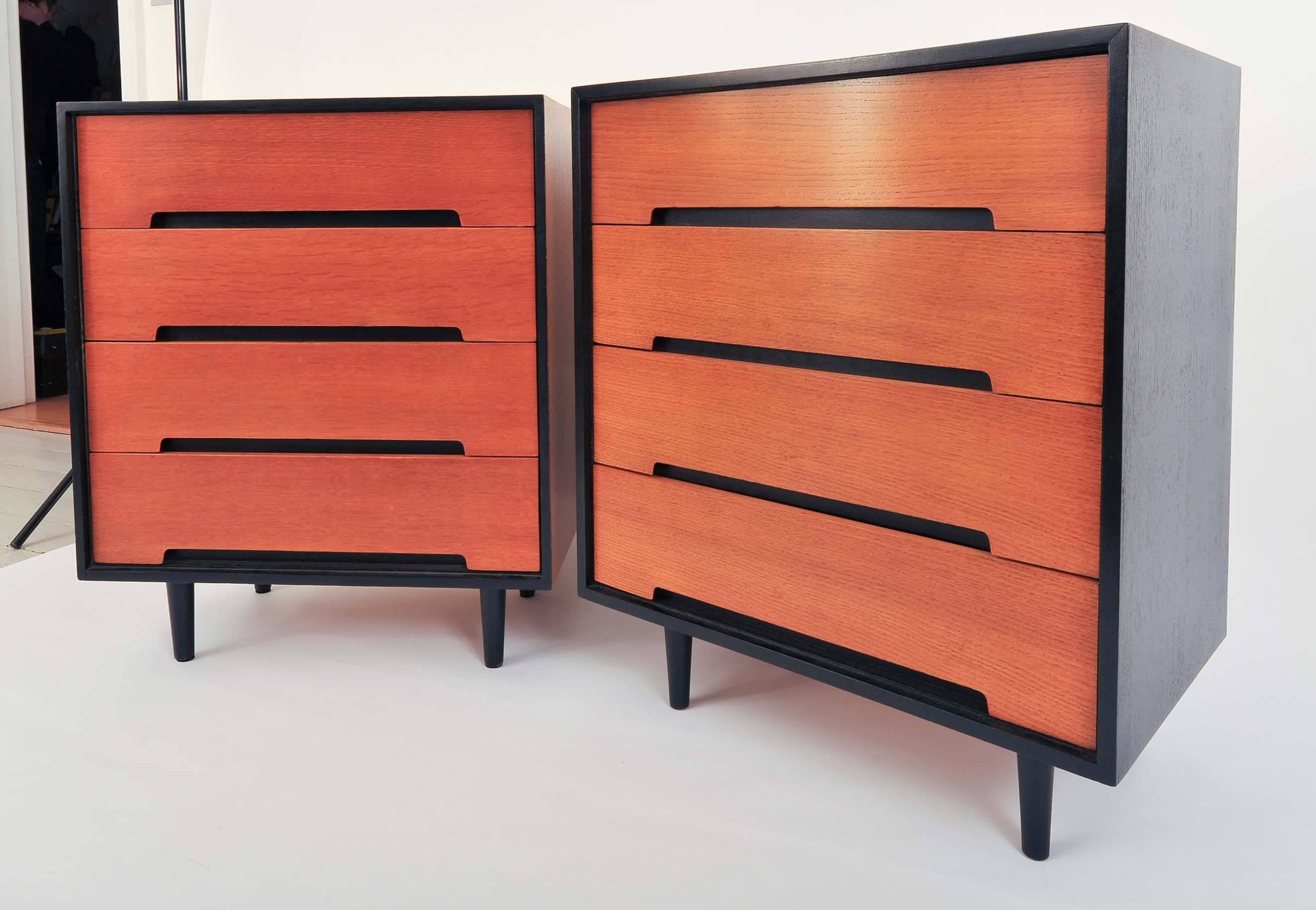 A 1960s black and wood four-drawer chest of drawers by renowned maker, Stag. The one with black top and sides is now sold but, the other with wood top and sides is available. It has black facings, feet and handles.

Basic to the door shipping