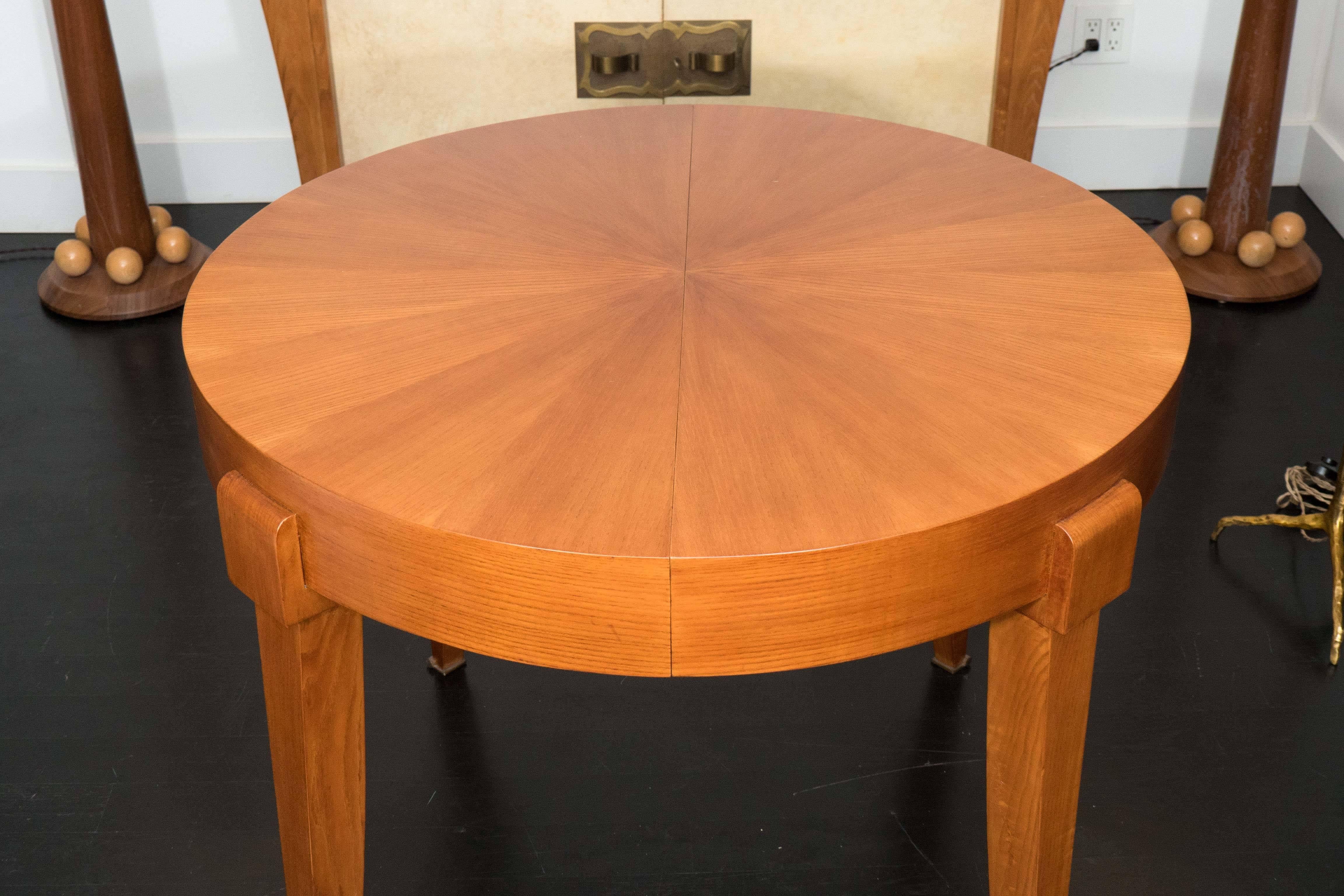 Oak center table with extendible marquetry top. Extensions not available, custom-made to order. Beautifully detailed legs with brass accents.