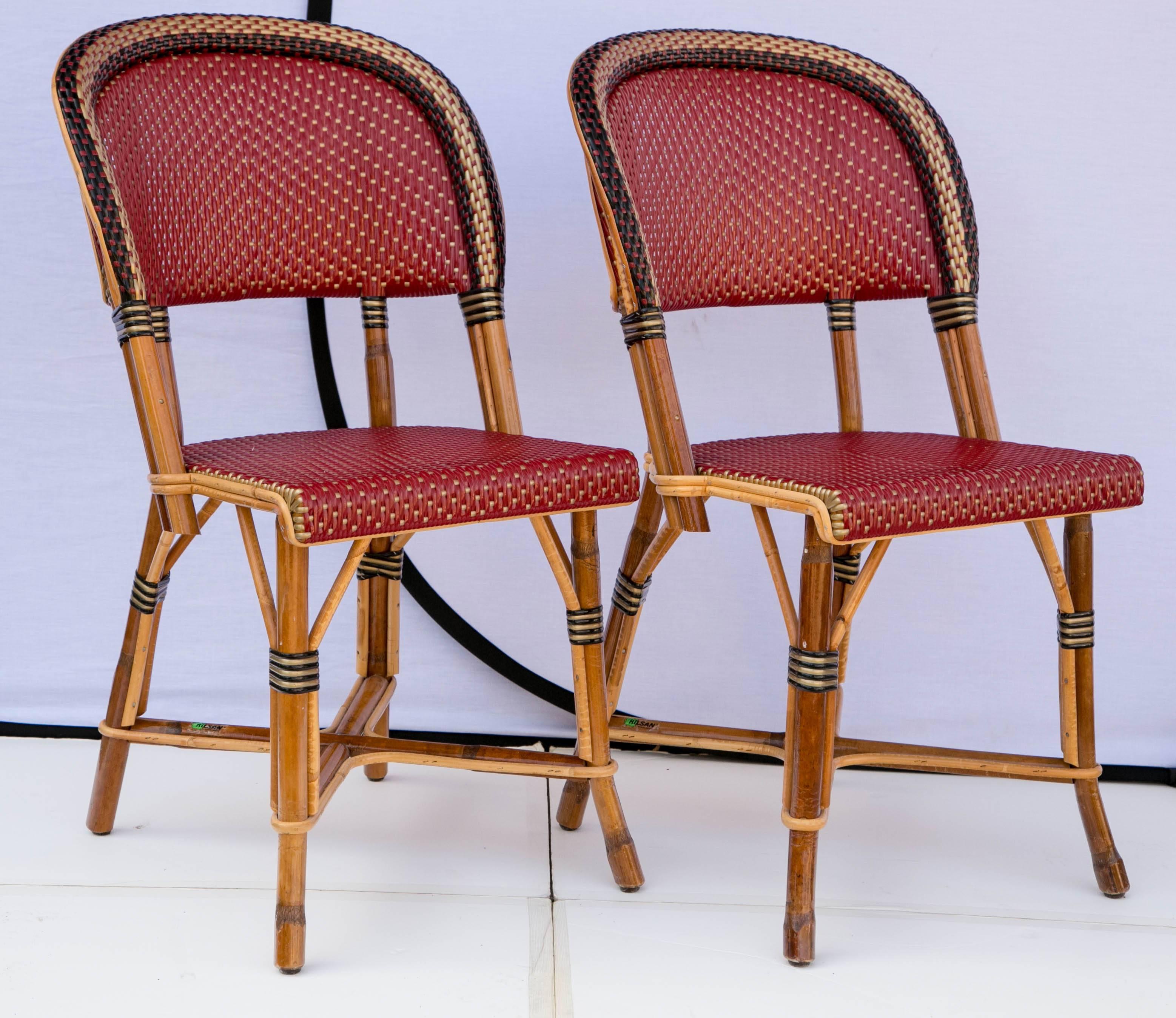 Fantastic authentic set of four Maison Drucker Bastille bistro chairs. Maison Drucker created furniture in rattan since the 19th century. Made of Rattan and Rilsan. Rilsan is not plastic - it is derived from the caster oil plant. Rilsan is virtually