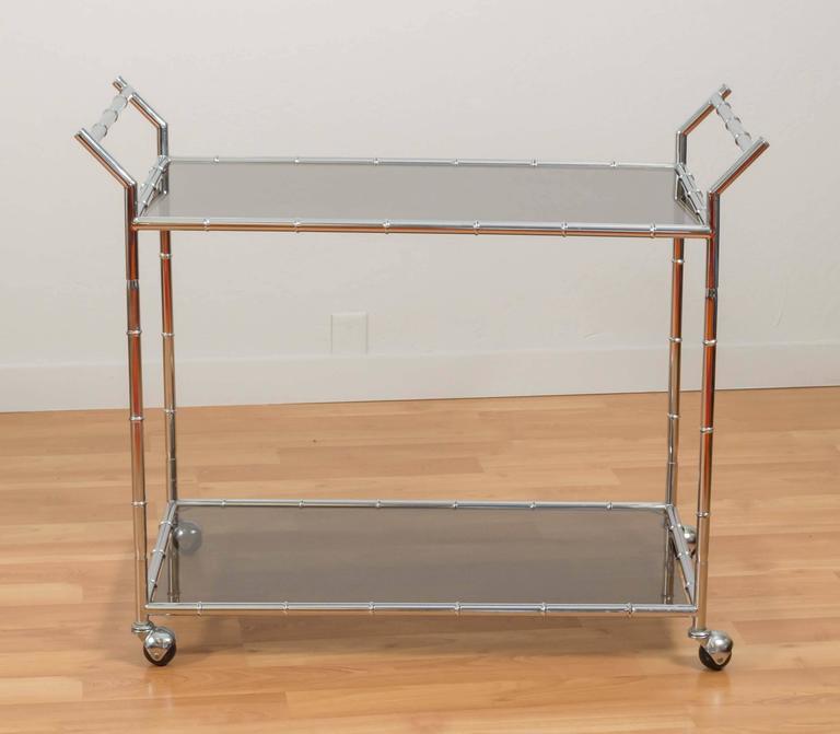 Hollywood Regency Faux Bamboo Chrome and Glass Serving Cart For Sale at