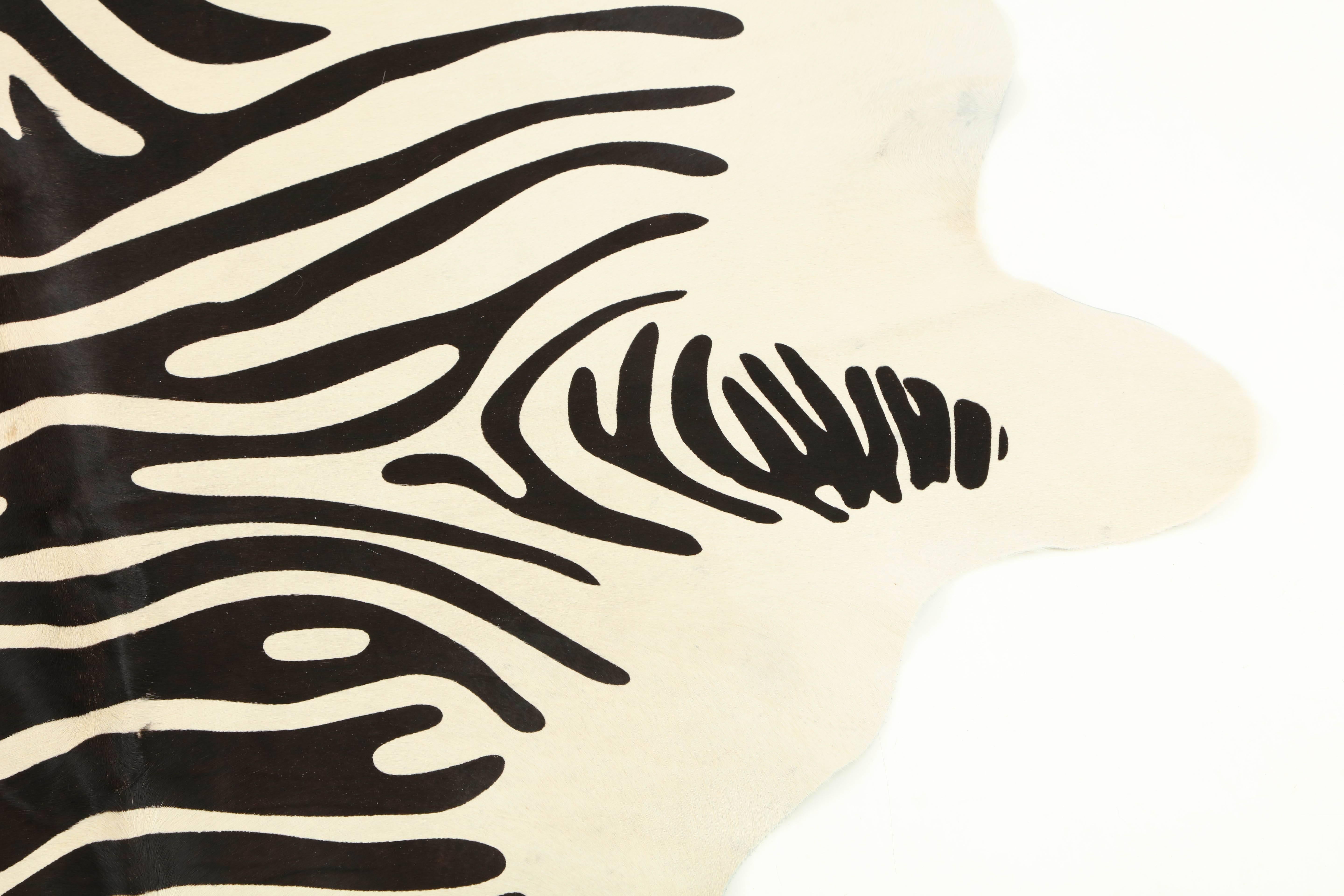 Stenciled Zebra Print Brazilian Cowhide Rug In Excellent Condition In New York, NY