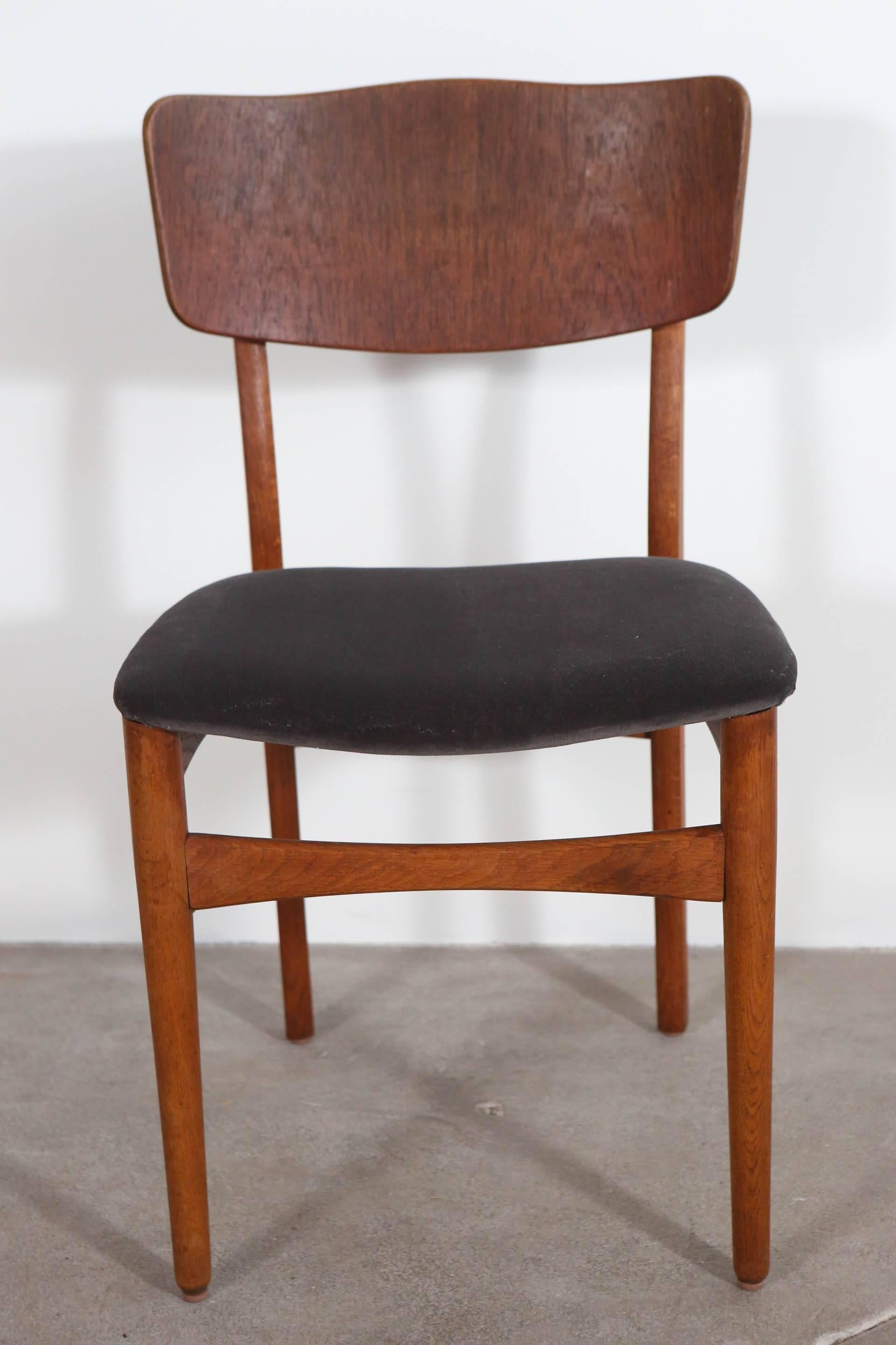 Teak framed Mid-Century dining chair with newly upholstered grey seat cushions.