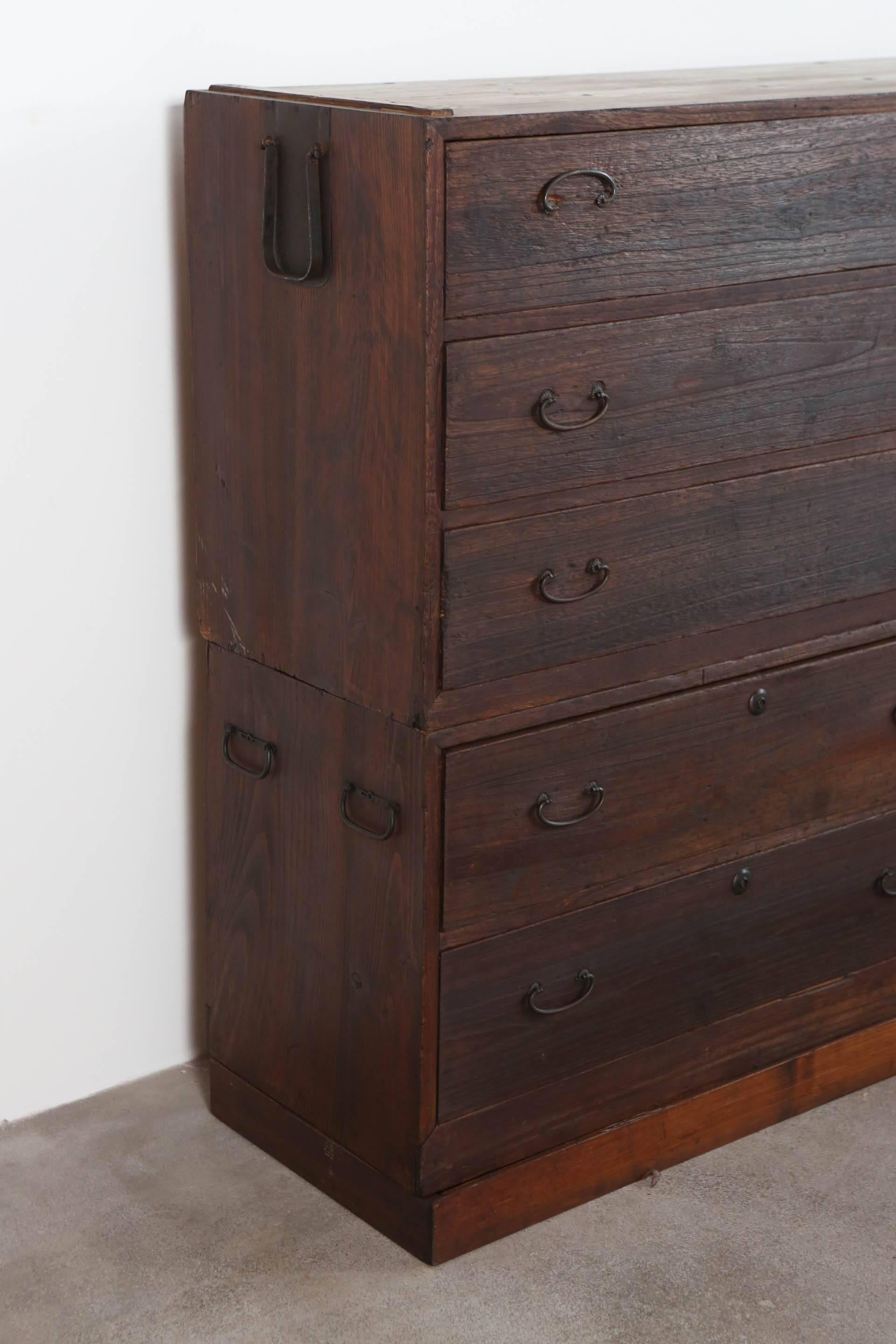 Rustic large two-piece Japanese tansu with ten drawers.