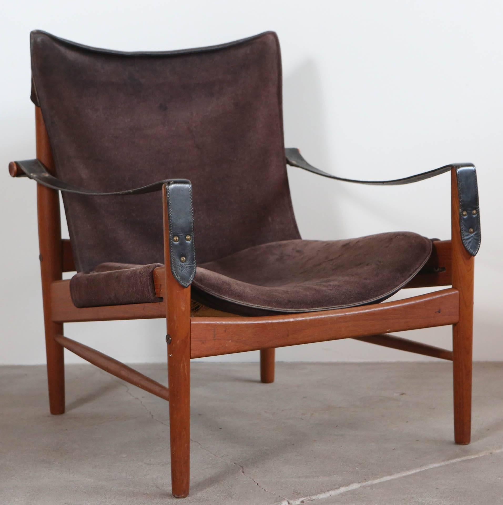 Pair of solid teak and suede Hans Olsen Safari chairs.
