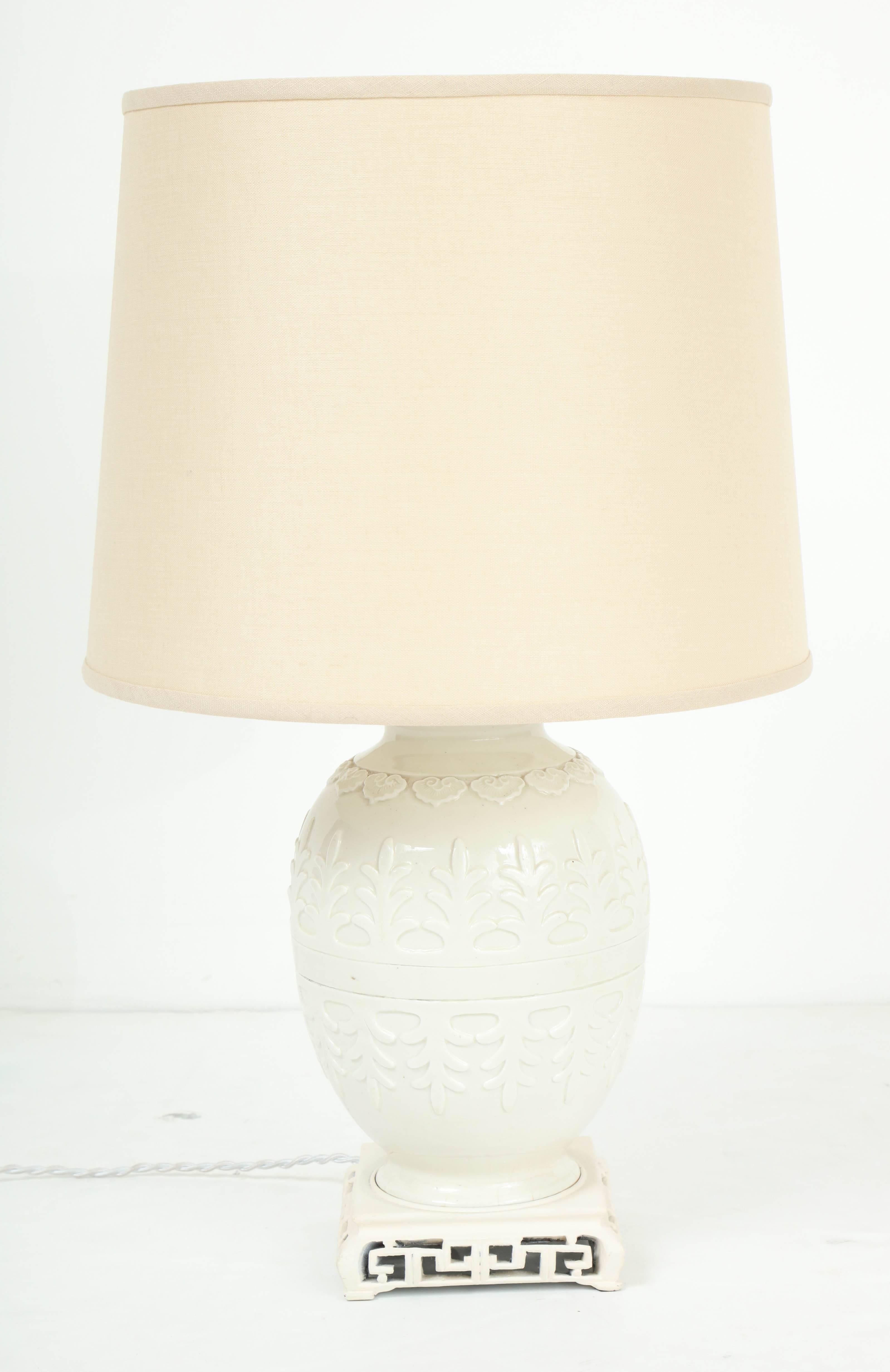 Blanc de Chine ovoid table lamp with original carved base, circa 1920.