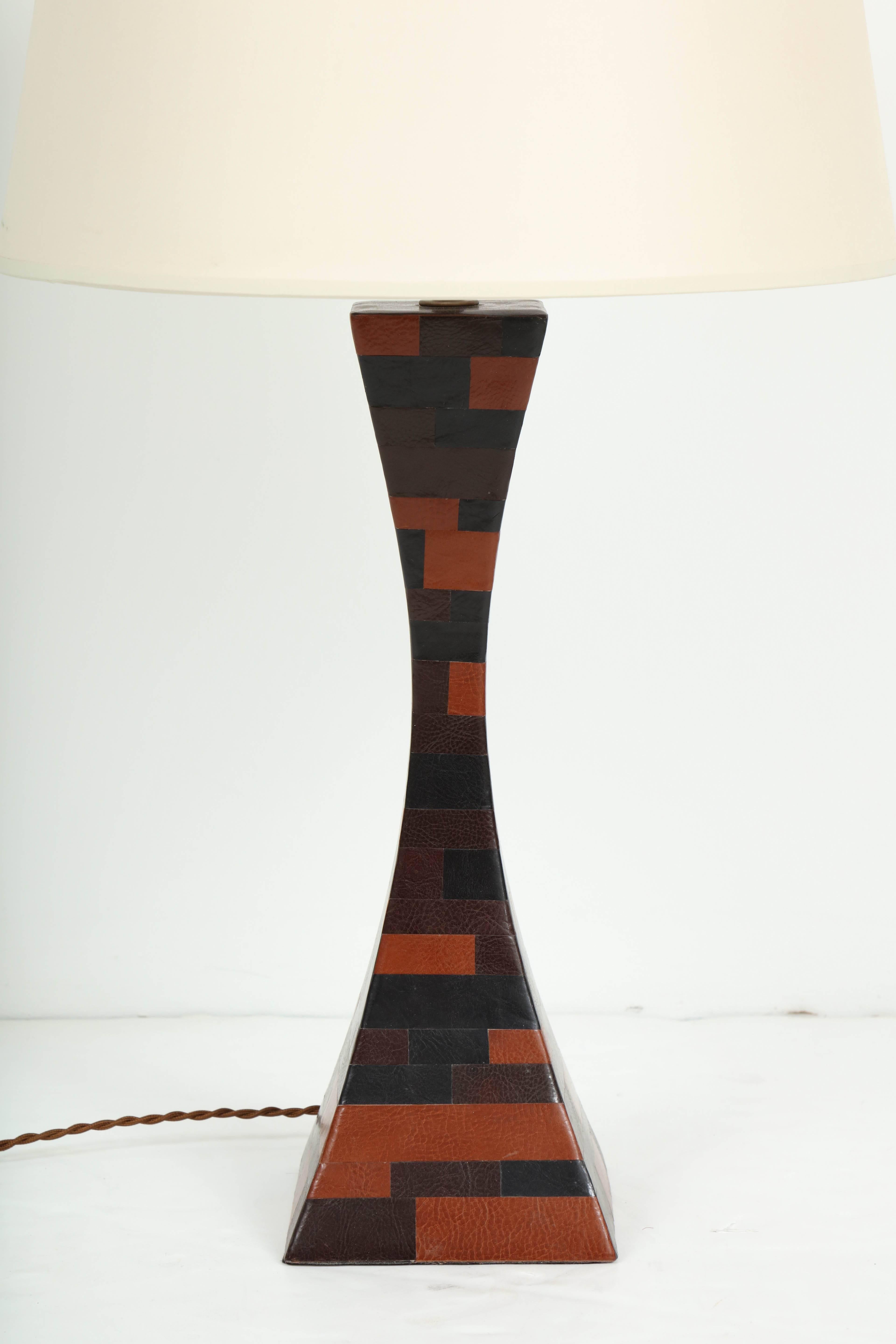 Double splayed table lamp in the manner of Stewart Ross, circa 1970 clad in brown patchwork leather.