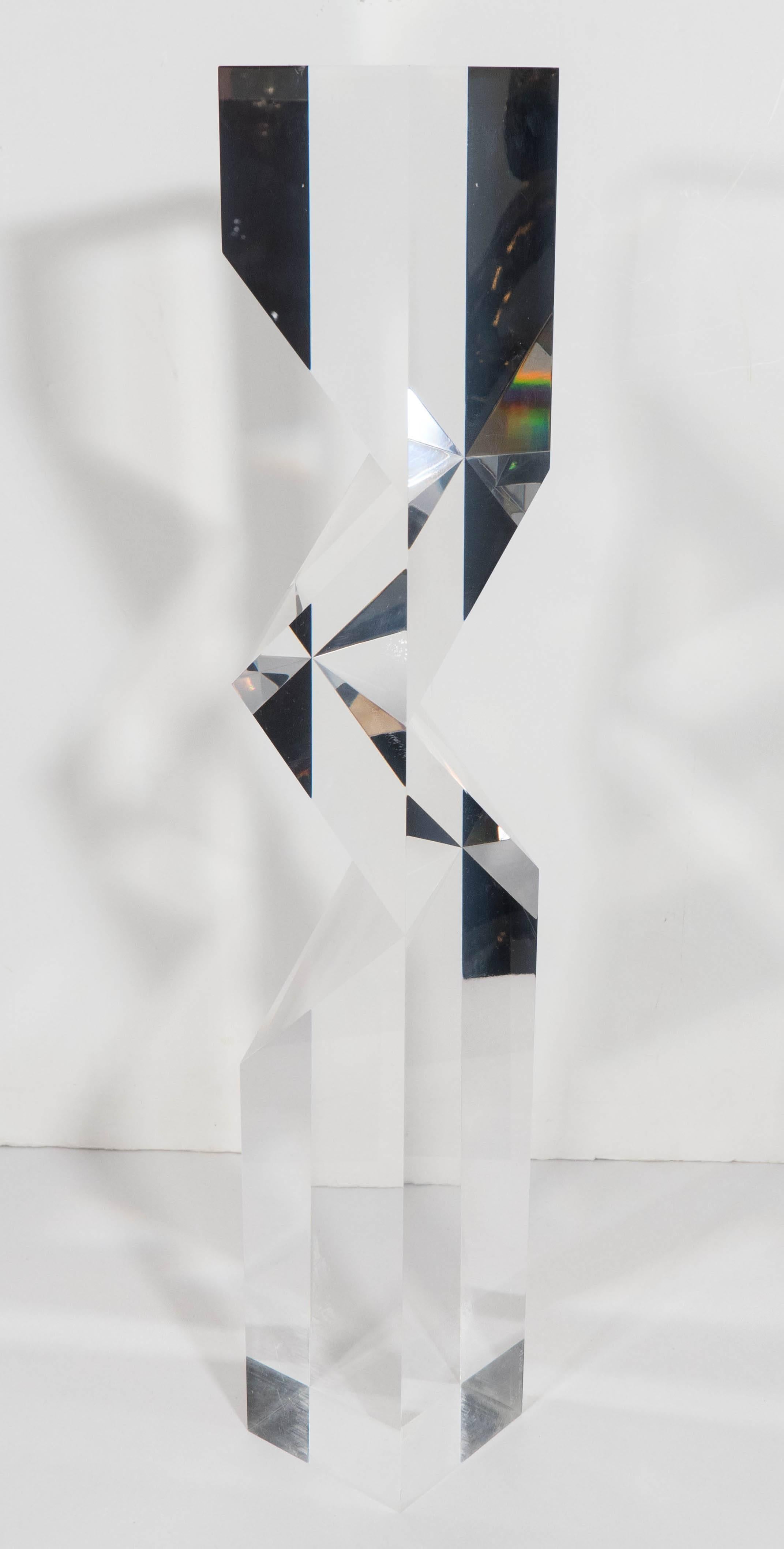 A elegantly long prismatic column sculpture in Lucite, produced in Italy, circa 1970s by Alessio Tasca, refracting light from all angles. Markings include signature [Tasca 500/1 Italy] to the base. The sculpture remains in very good condition,