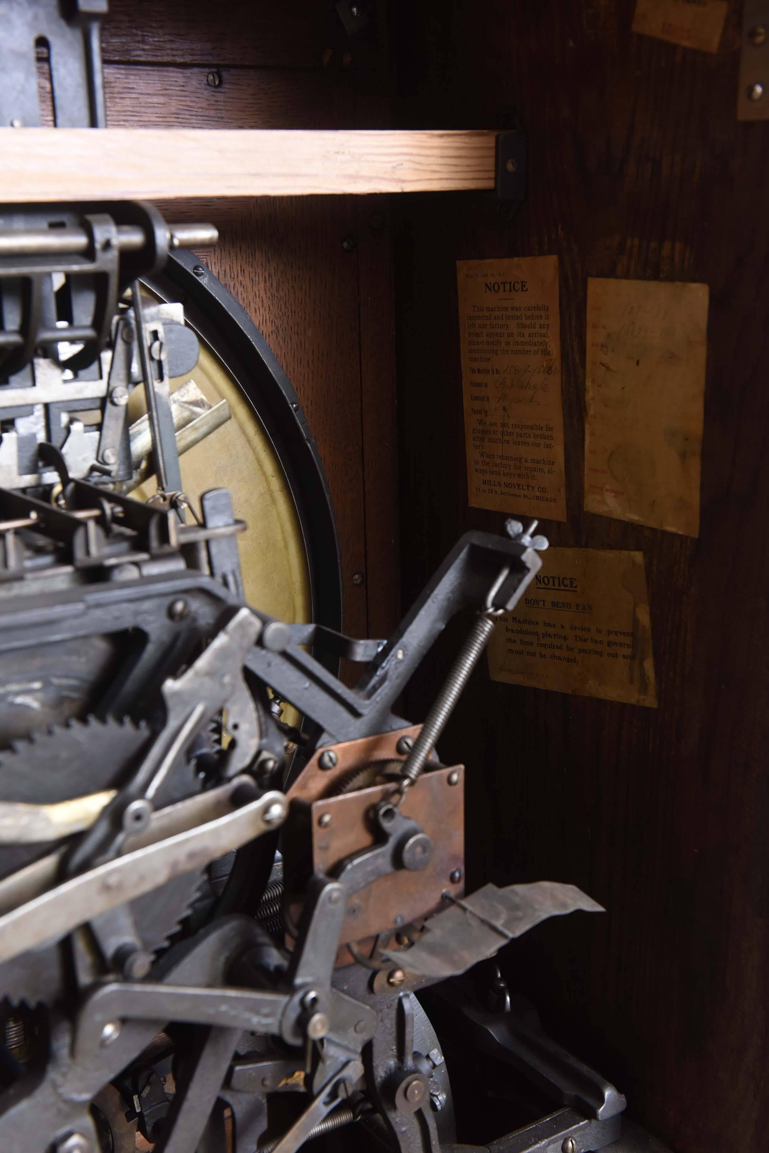 1906 Mills Double Dewey Upright Slot Machine 1