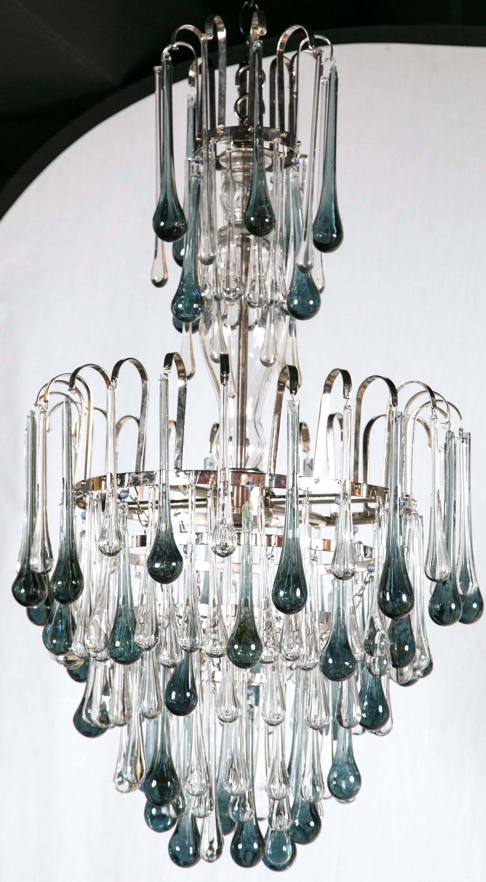A lovely pair of Murano glass chandeliers with blue colored tear drops, circa 1930. Priced per chandelier.