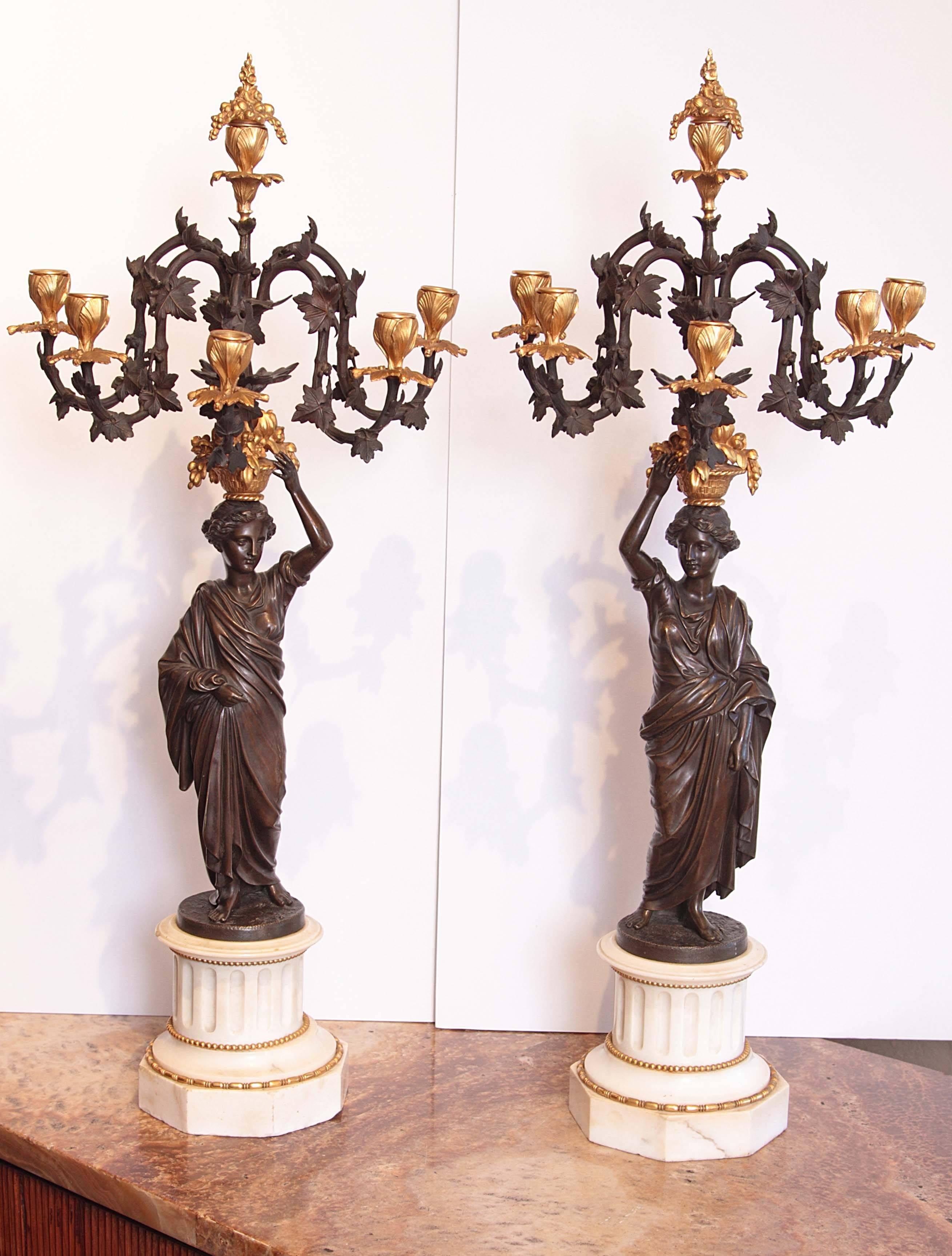 Pair of 19th century French Louis XV gilt bronze and patina. Carrara marble bases signed F Barbedienne.