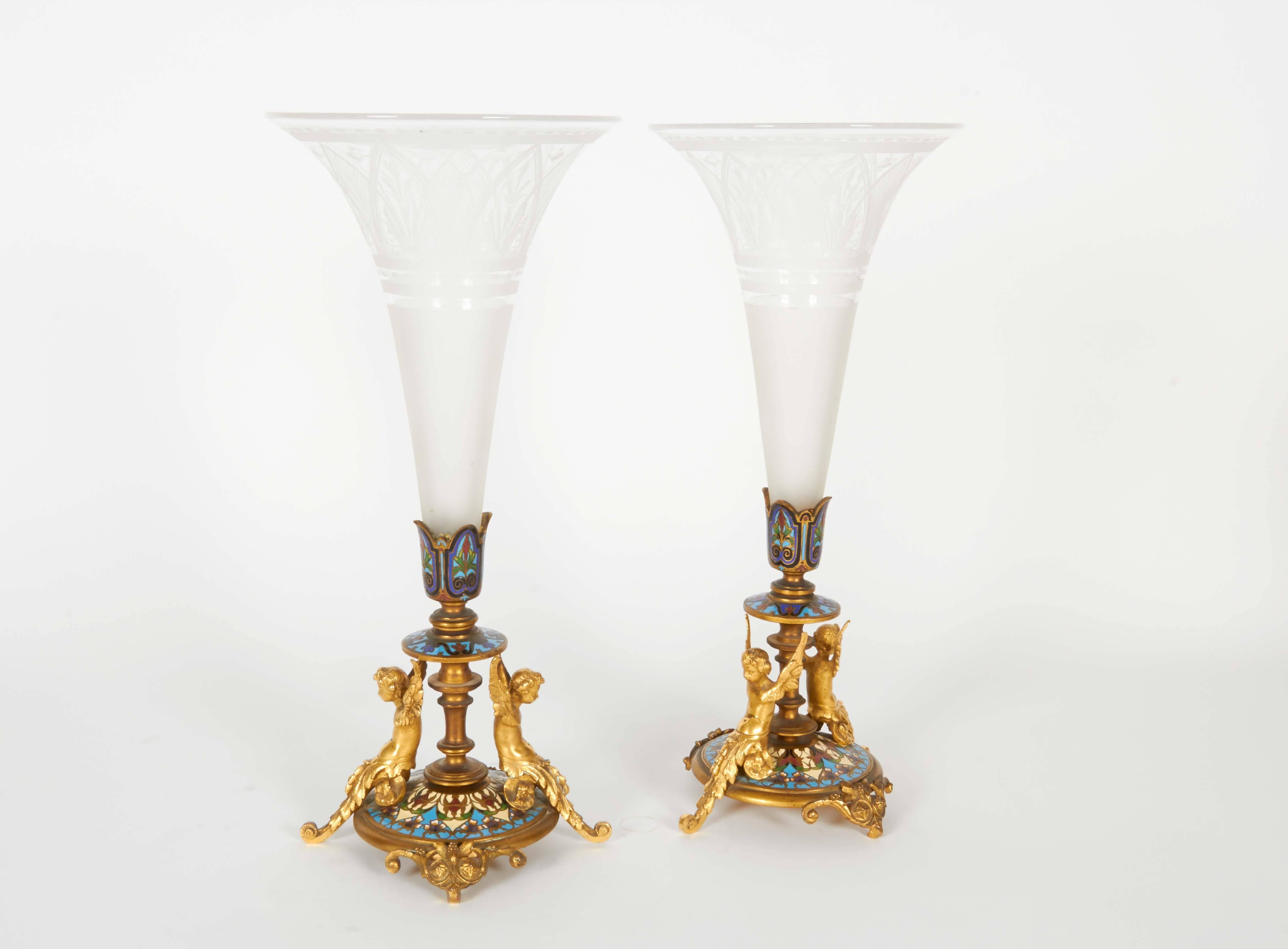 Very nice pair of French ormolu champleve / cloisonne enamel vases with original frosted glass inserts.

 