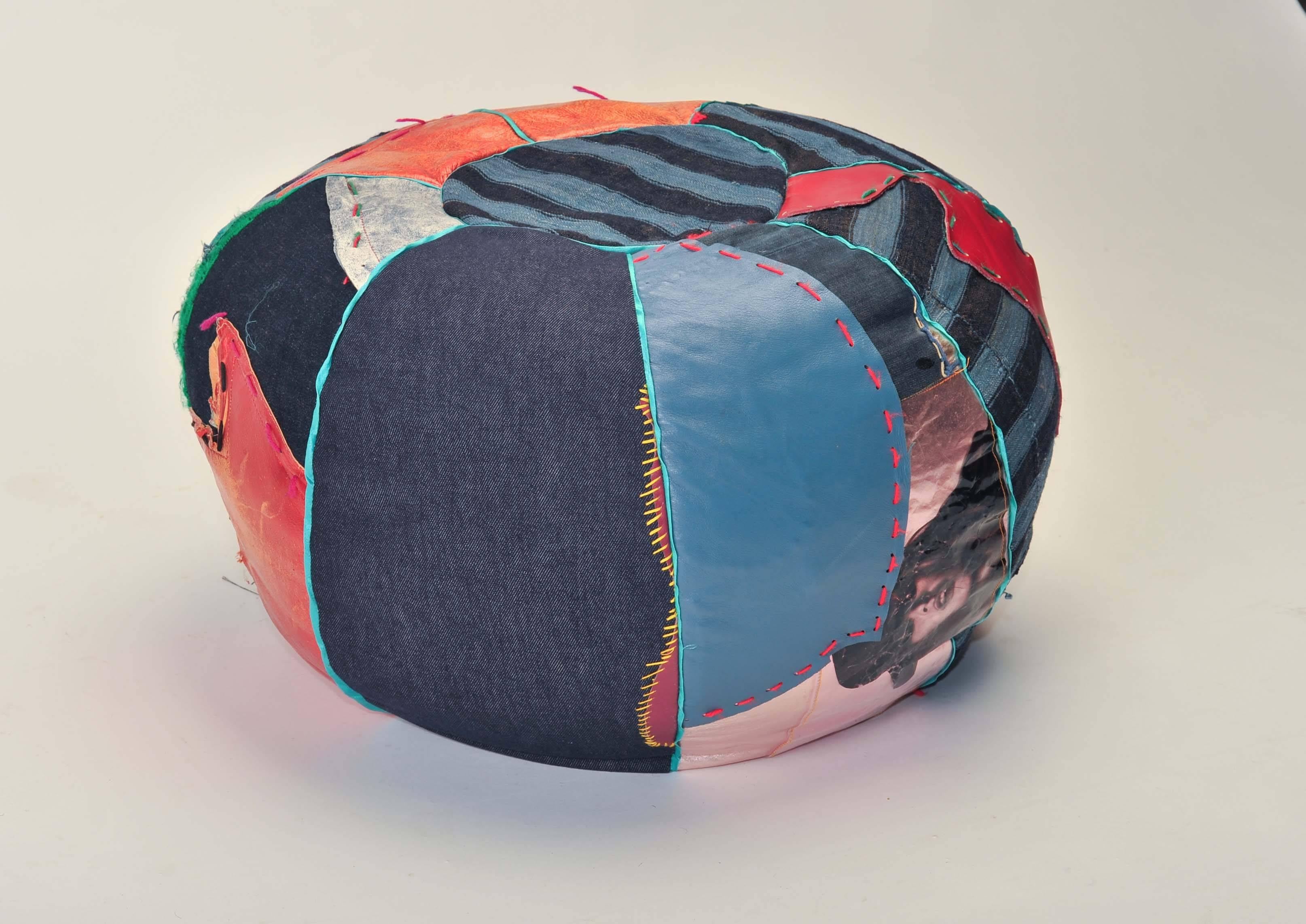 A unique handmade Bohemian/Rock and Roll style ottoman/pouffe/floor cushion. Made out from customised 1960s1970s vintage jeans denim, leather, complemented with an early 19th-century Dutch funeral blanket and hand embroidery.

Made by Joelle