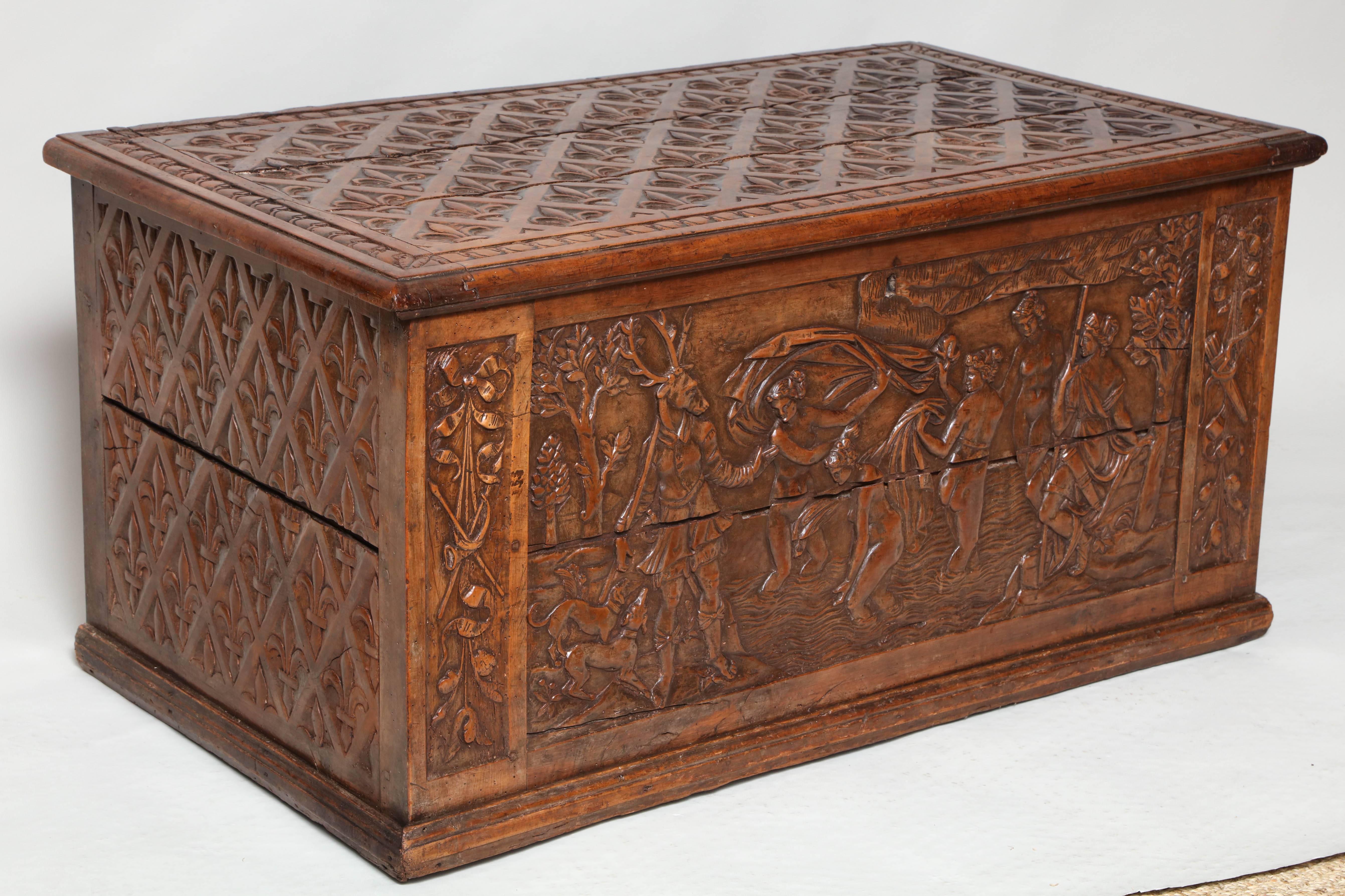 Very fine 16th century carved pear or boxwood coffer, the lid and sides chip carved with fleur-de-lis pattern, the front carved with a depiction of Diana and Actaeon, the noble hunter who accidentally interrupted a bathing Diana and who was turned