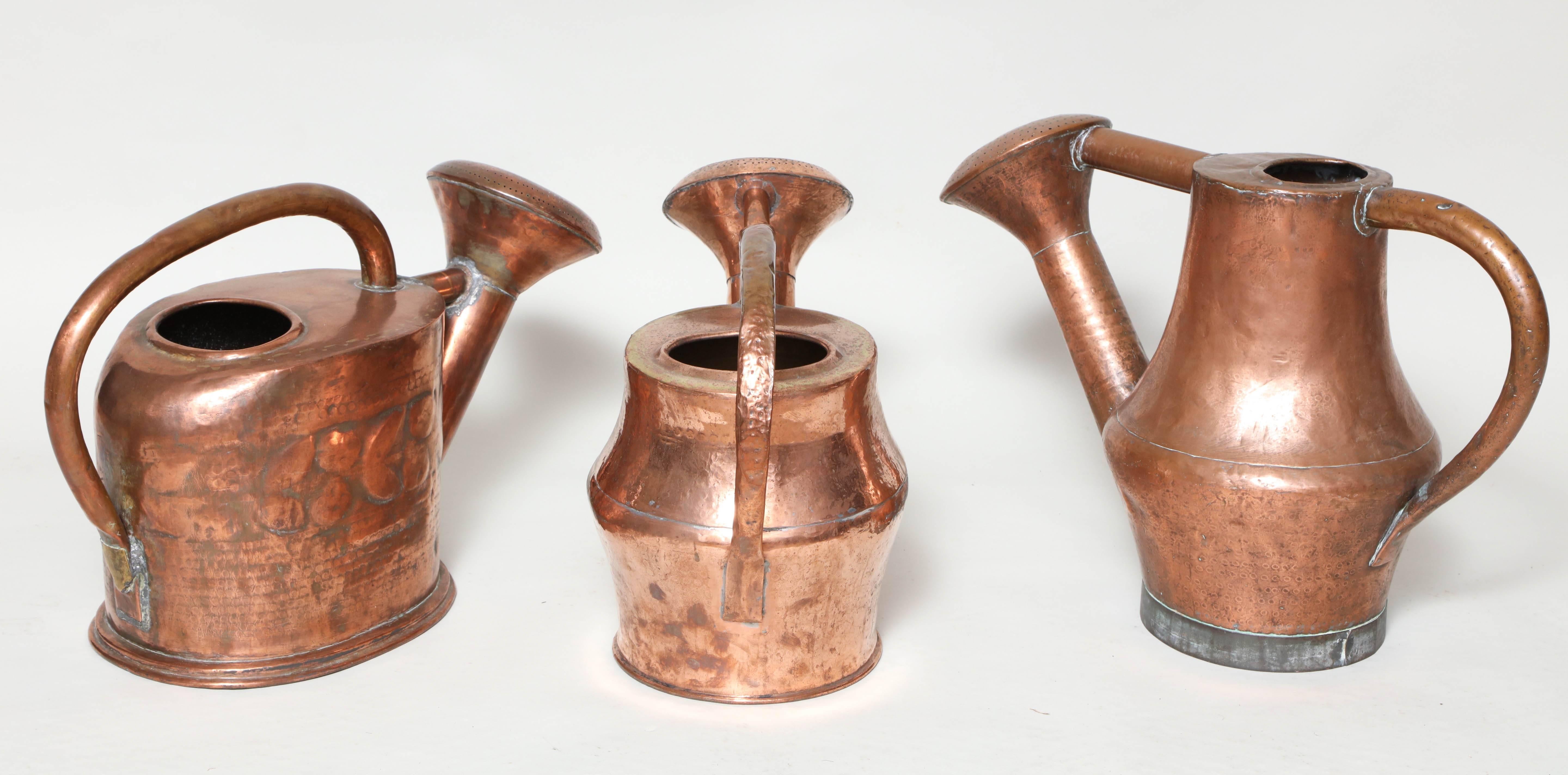 Three Copper Watering Cans 1