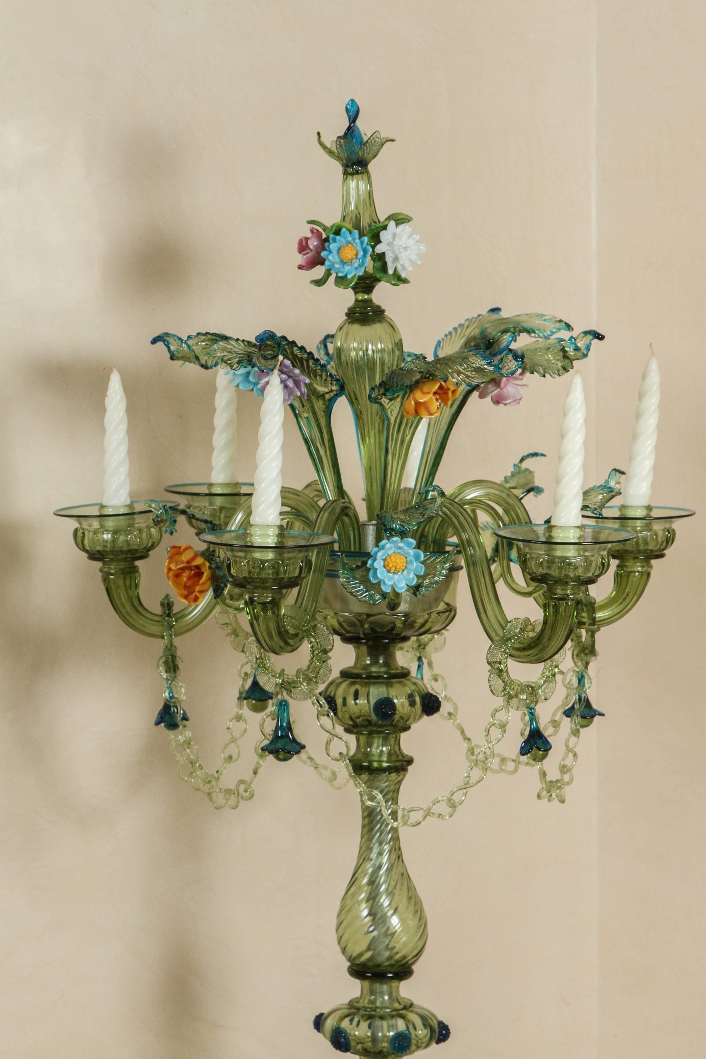 Single Mid-Century Modern very rare Murano standing candelabra floor lamp. It has multicolored applied flowers with a Citrine base color. The lamp has a Murano glass chain which is rare. There are two original small pieces missing that are not