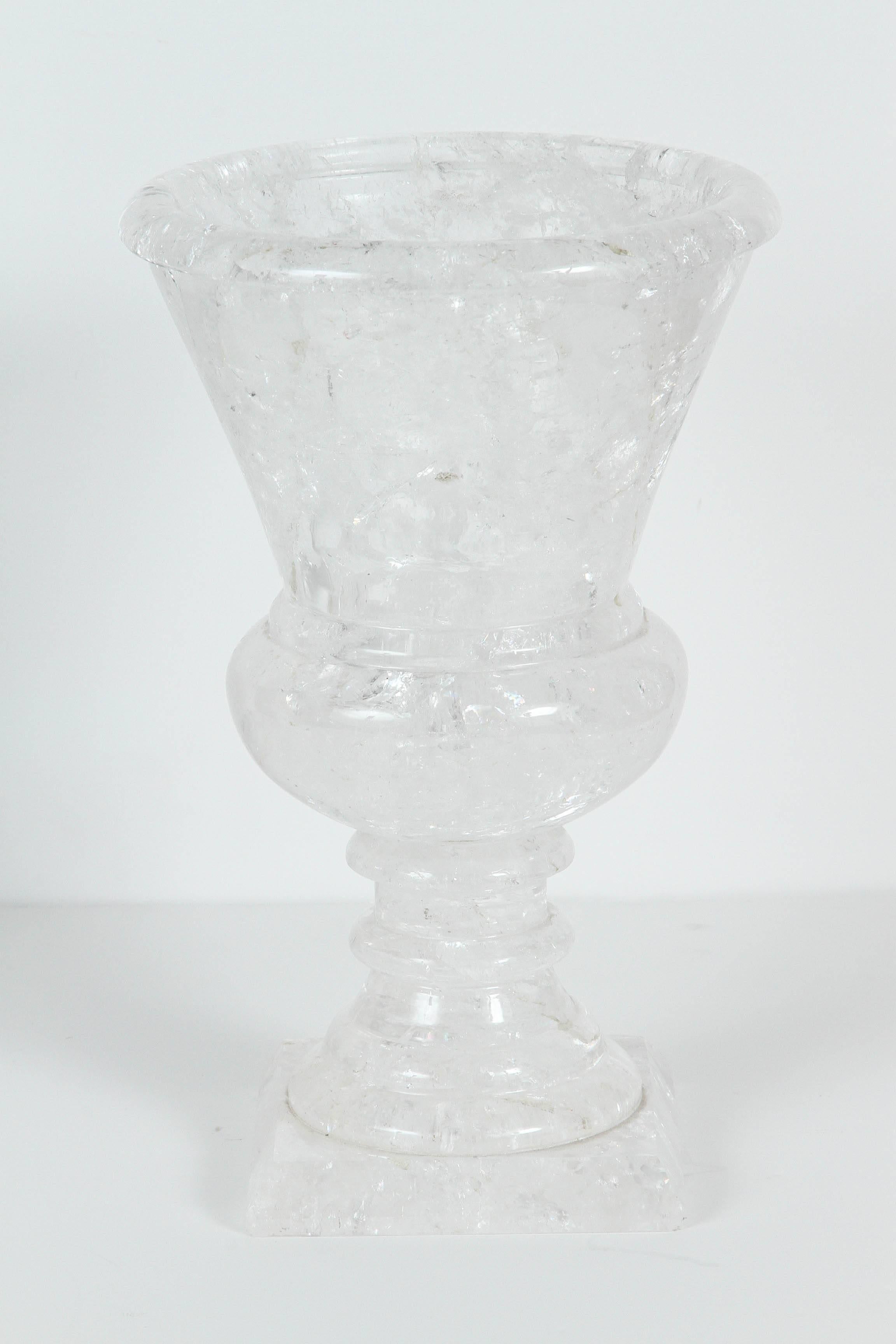 Pair of modern rock crystal pedestal urns. The rock crystal is extremely high quality. The base measurement is 5 inches. The price below is for a pair but there are others available.
