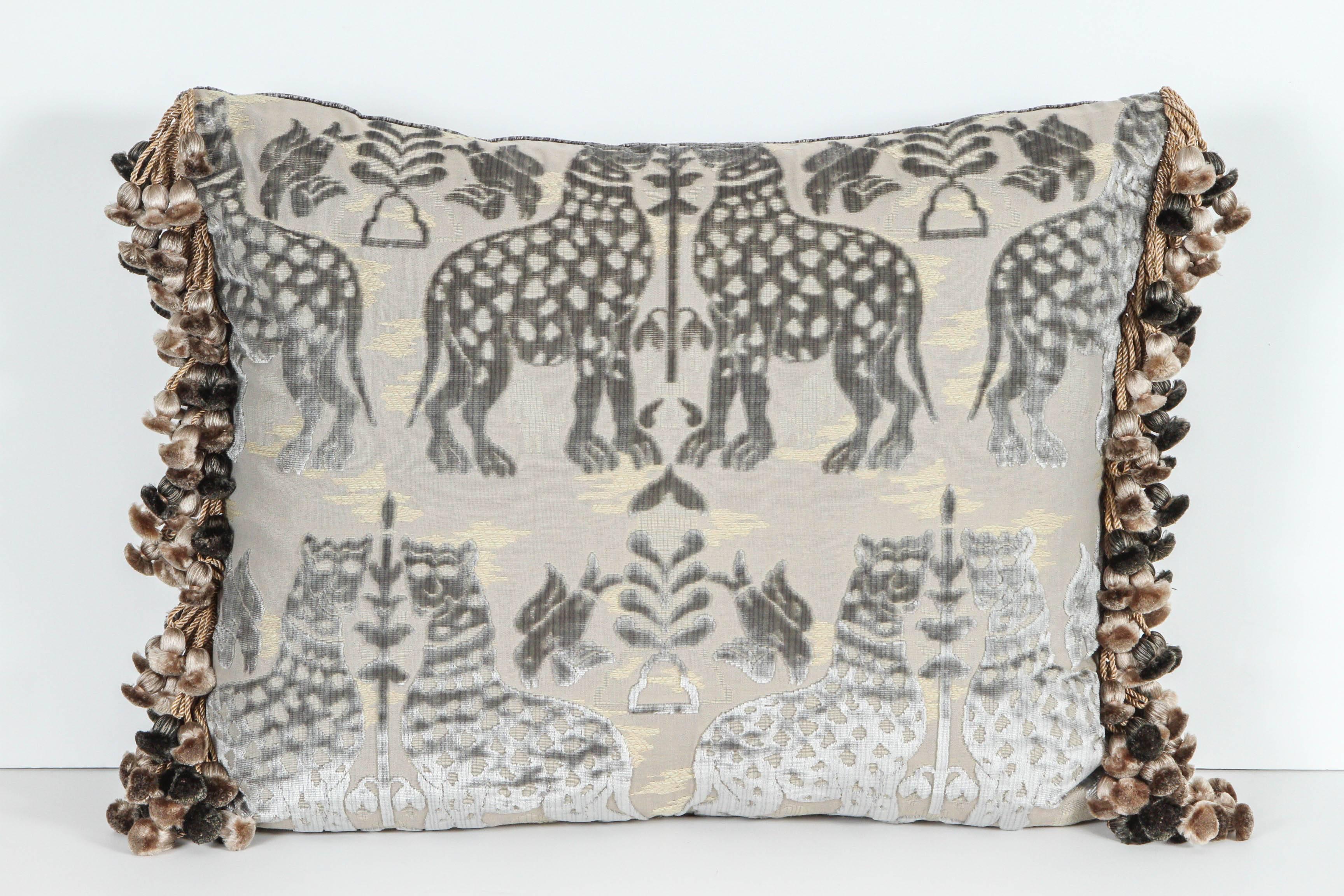 Pair of Luigi Bevilacqua cut silk velvet pillows with mythological theme including Animals and Birds. They are silvery gray with silk trim and silk velvet charcoal colored striae design backing. Featuring Janet Yonaty Silk tassel trim. The pillows