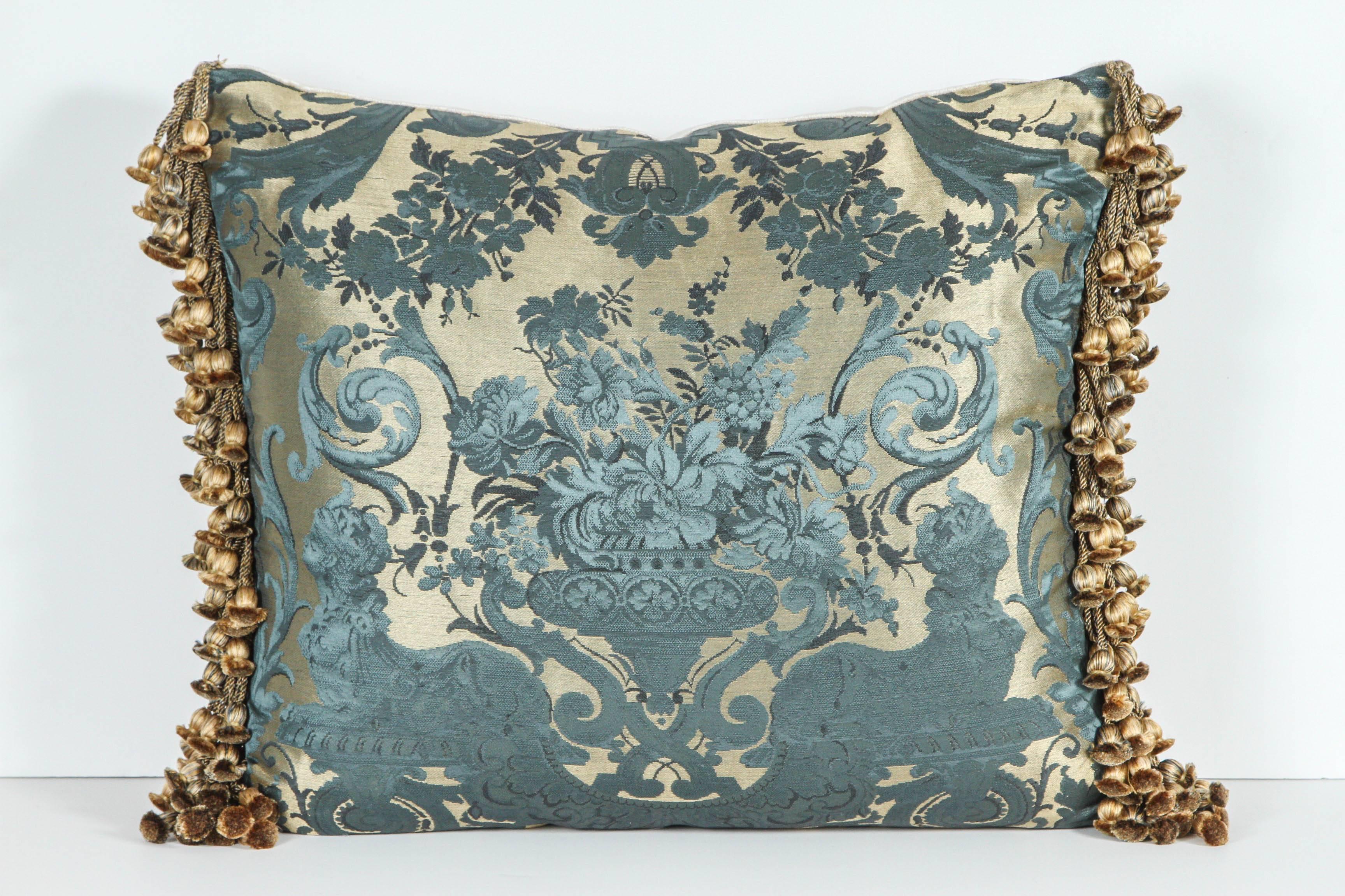 Pair of Luigi Bevilacqua brocade silk pillows with flower basket motif. The pillows have silk trim and silk velvet backing in gold and royal blue. They feature Janet Yonaty silk velvet backing and tassels. Luigi Bevilacquat is the official fabric