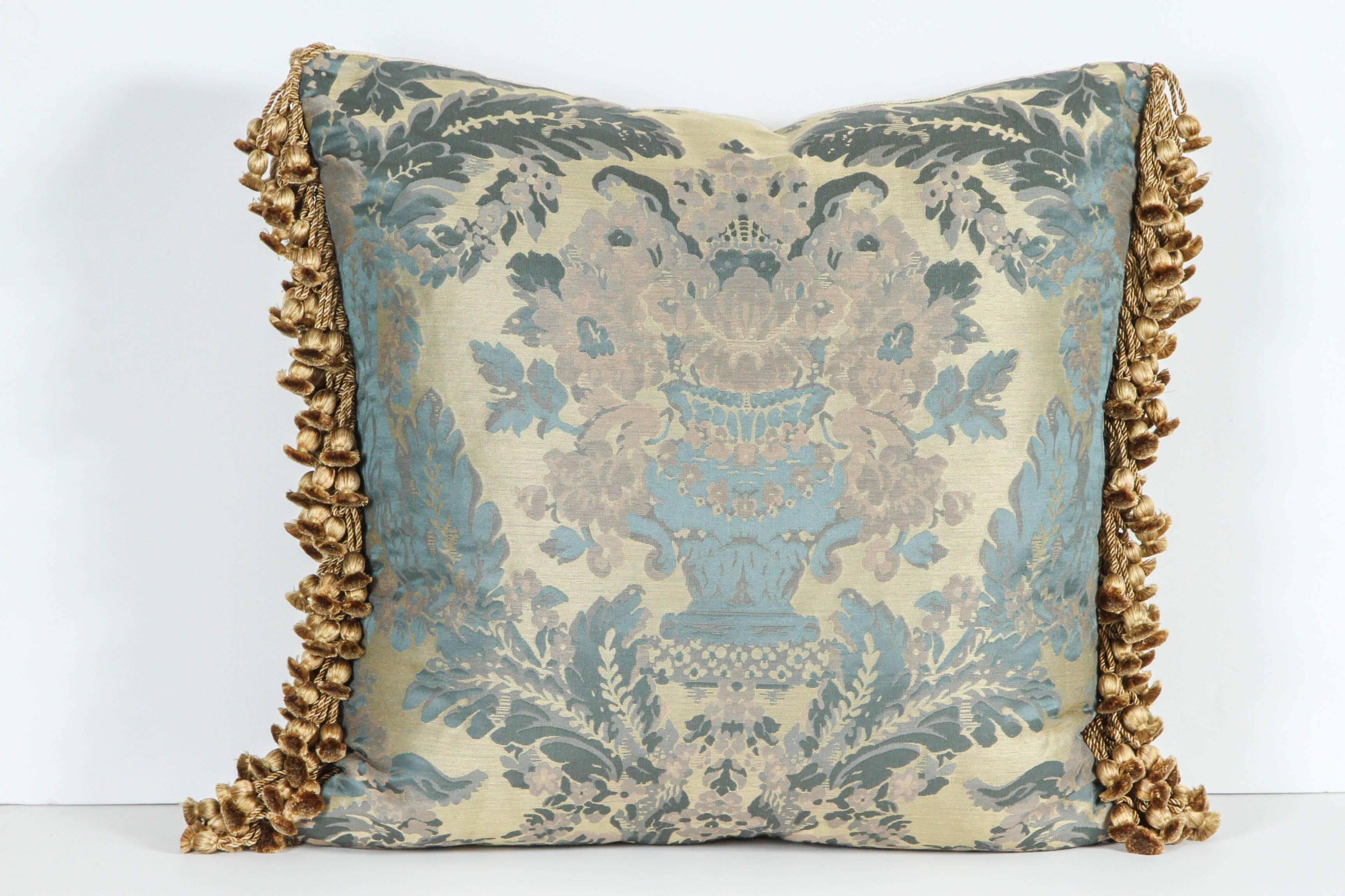 Pair of Luigi Bevilacqua brocade silk pillows with flower basket motif. The pillows have silk trim and silk velvet backing in soft blues, mauve and gold. Featuring Janet Yonaty silk velvet backing and tassels. The prices listed for for one pair but