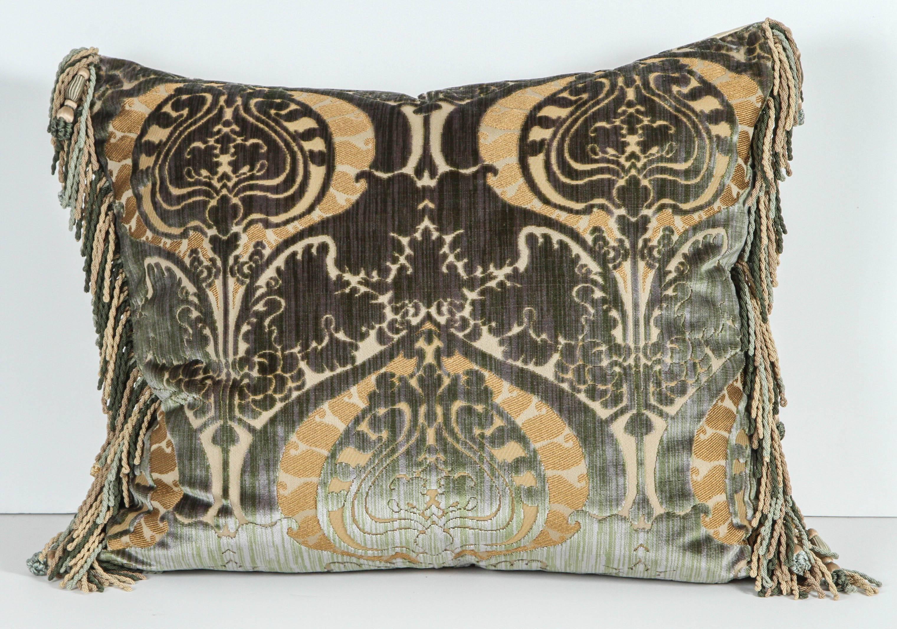 Pair of Luigi Bevilacqua silk velvet pillows with silk trim and silk velvet backing in golds and greens. Featuring Janet Yonati silk velvet backing and trim. Luigi Bevilacquat is the official fabric maker to the Vatican. The price listed for one