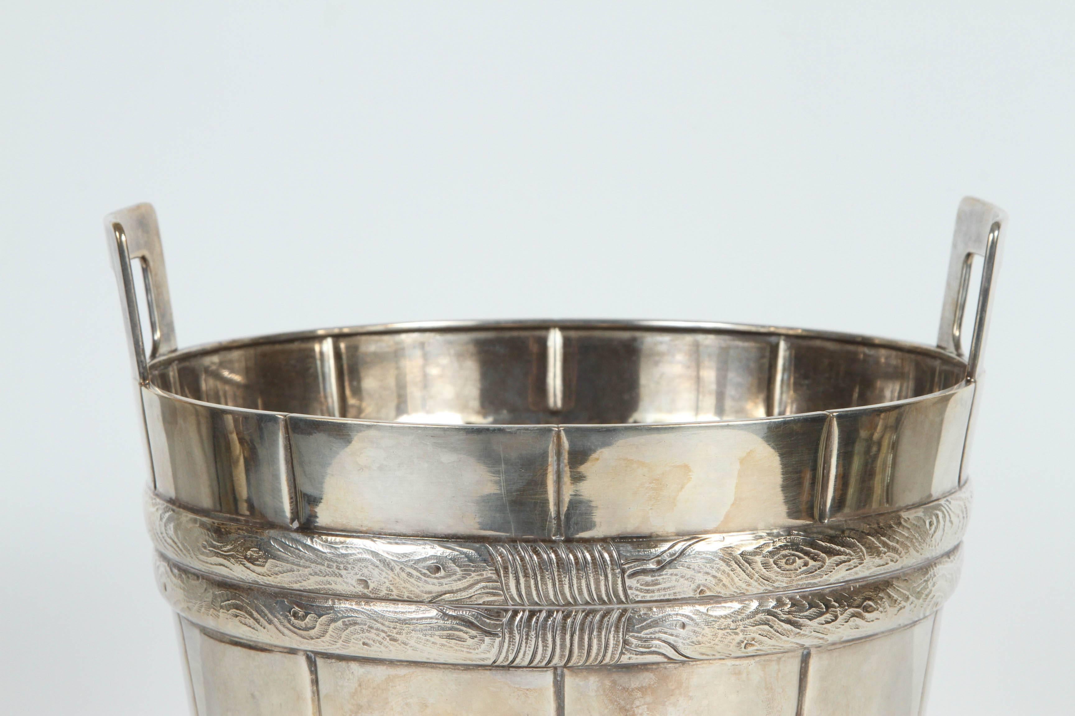 1940s-1950s single bucket motif sterling silver ice bucket with handles. The base diameter measurement is 6.75 inches. Signed Tiffany and Co.