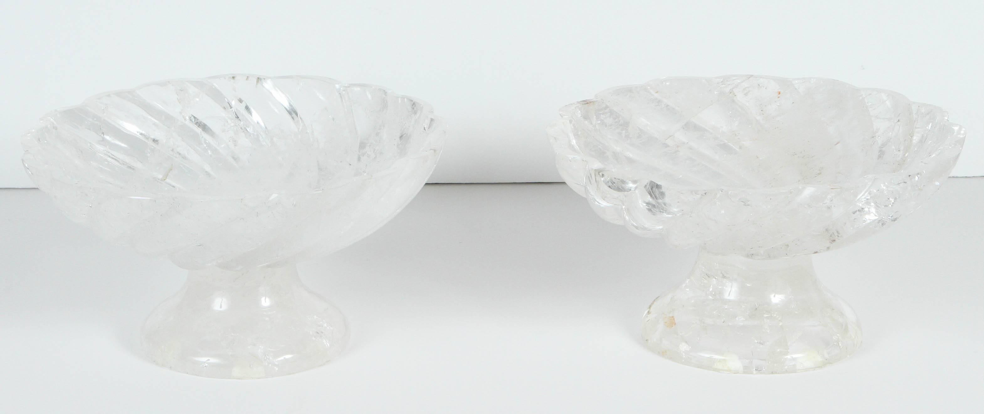 Pair of modern carved rock crystal compotes with scalloped edge detail. The rock crystal is extremely fine quality. The base diameter measurement is: 5 x 5.