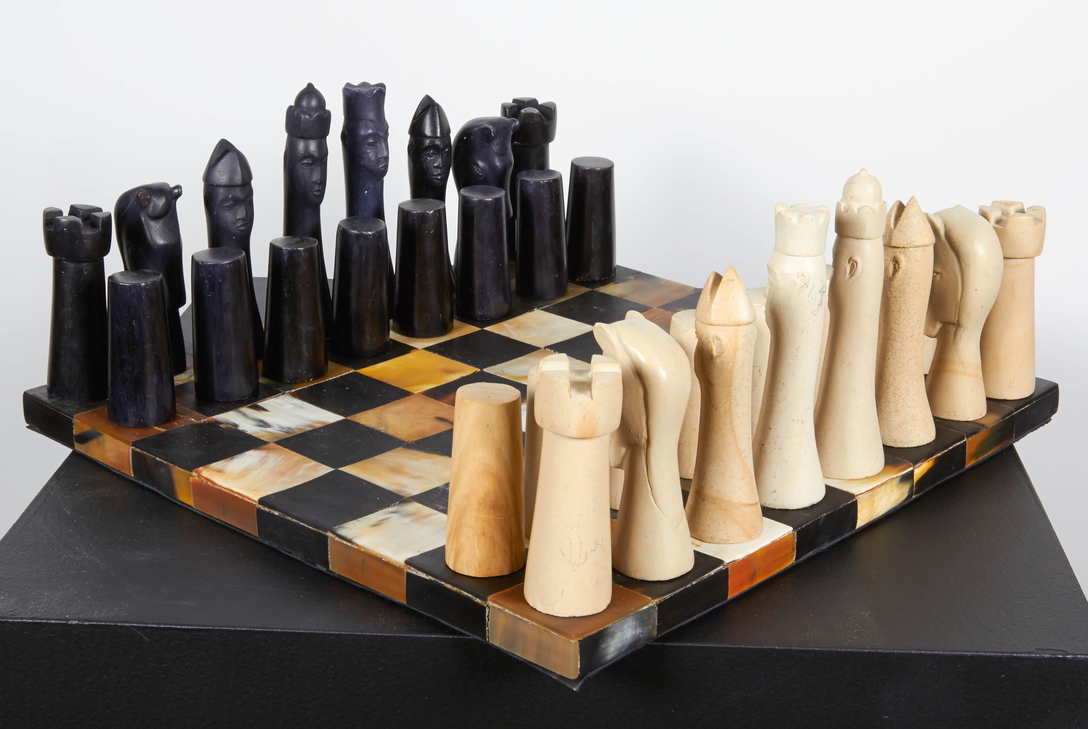 This sustainable horn-and-stone chess set is an Exclusive Design inspired by the bridge between past and future. Each chess piece is hand-carved out of stone. Local Haitian craftsmen have collaborated with D.O.T, the Design, organization and