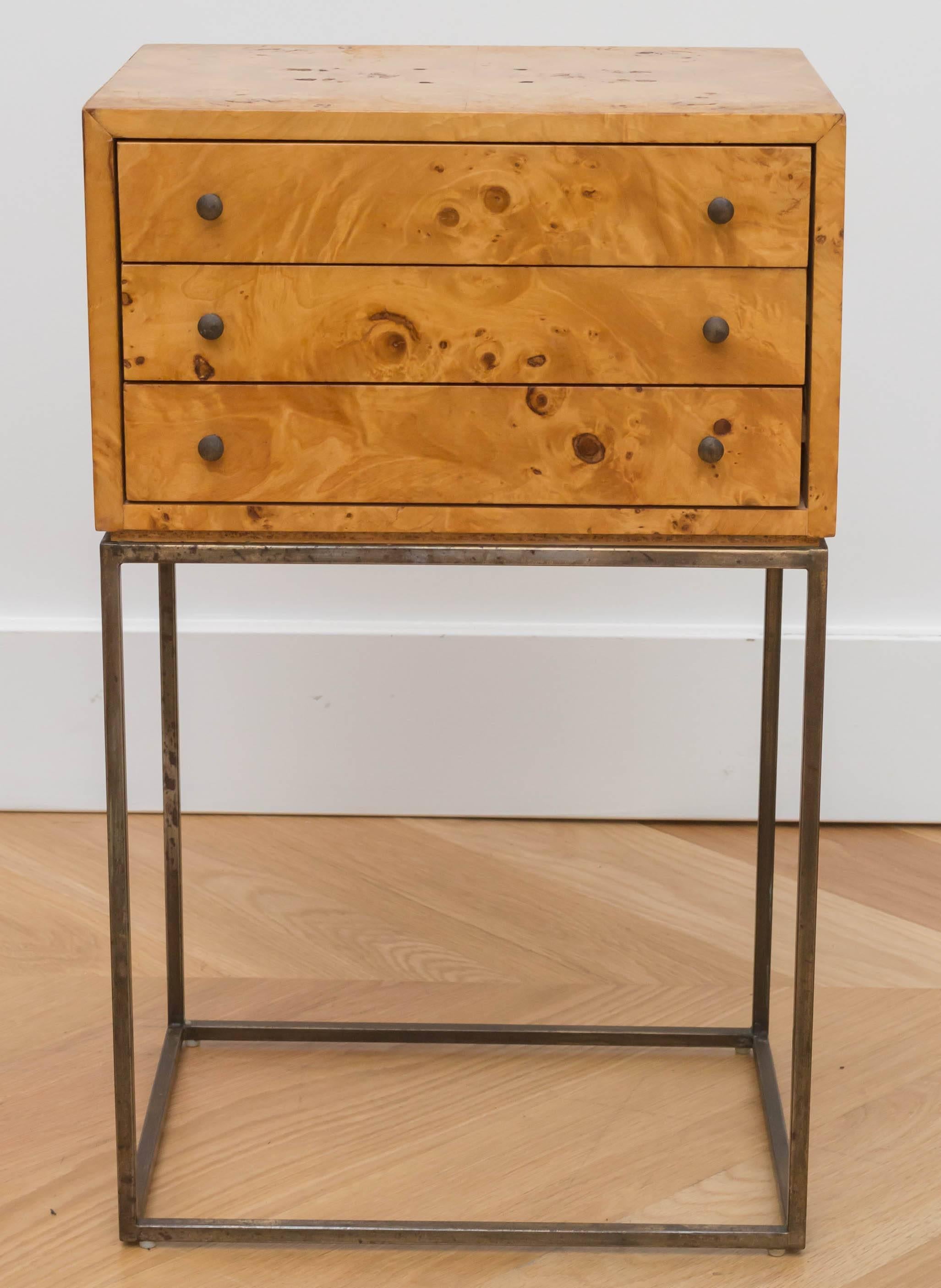 Milo Baughman olive burl single nightstand with a patinated brass base.