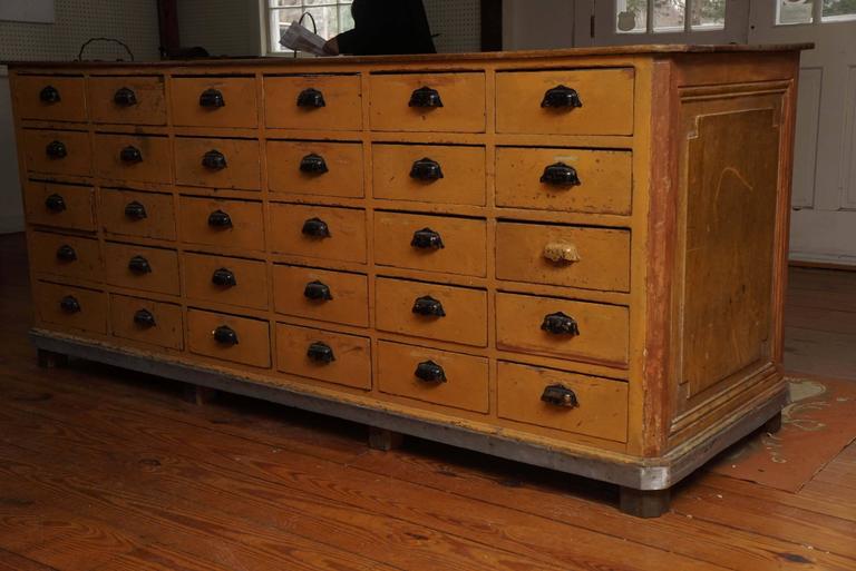 French Hardware Store Counter with Drawers on Both Sides at 1stDibs