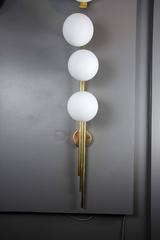 Set of Six Tall Brass and Globe Wall Sconces