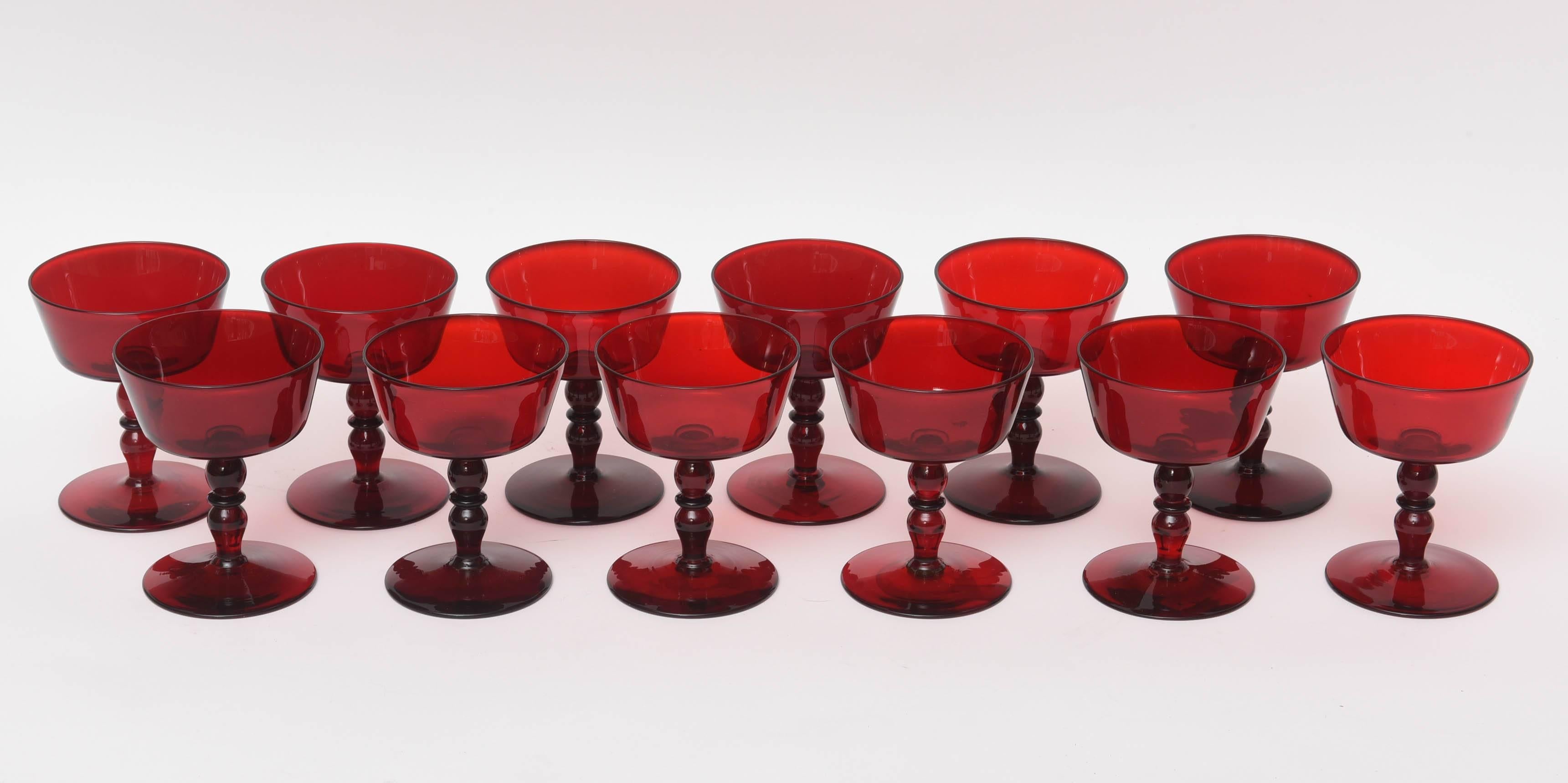 A wonderful set of vintage red glass blown champagne or sherbet coupes. Well balanced and the perfect size. Crisp and clean color throughout.